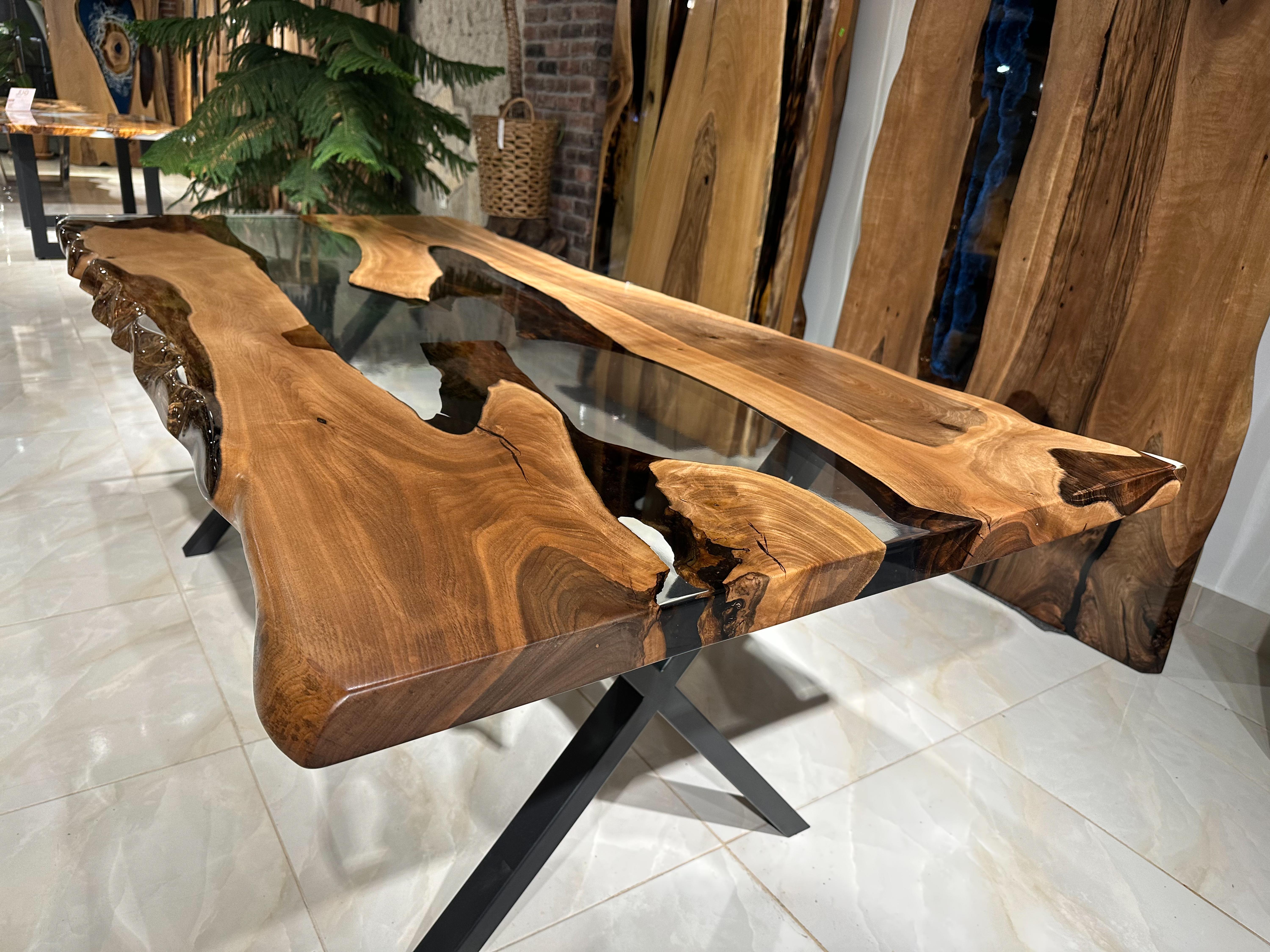 Custom Epoxy Resin Dining Table - Epoxy Resin Wood Table

This table is made of 500 years old Walnut Wood. The grains and texture of the wood describe what a natural walnut woods looks like.
It can be used as a dining table or as a conference table.
