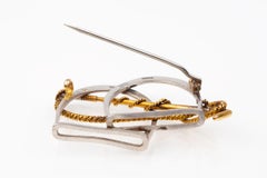 Equestrian Brooch, Two Stirrups & Crop in Platinum and Gold, English circa 1920