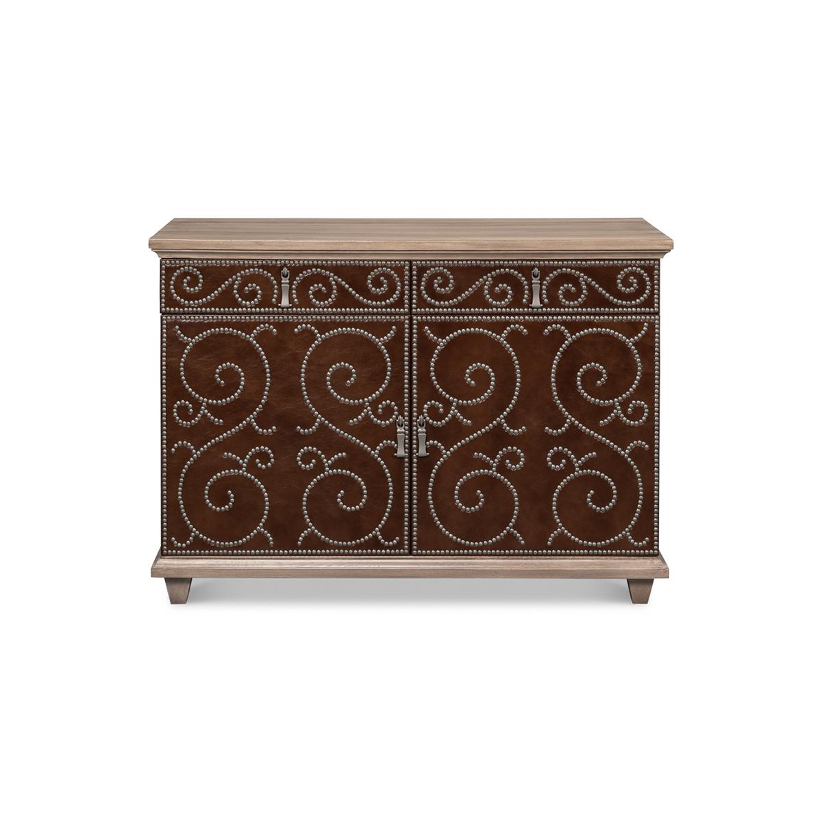 A classic equestrian-inspired brown leather-wrapped cabinet. This two-drawer and two-door cabinet has a refined design with hand-hammered nailhead accents. The top and base are finished in a barn grey wood finish.

Dimensions: 48