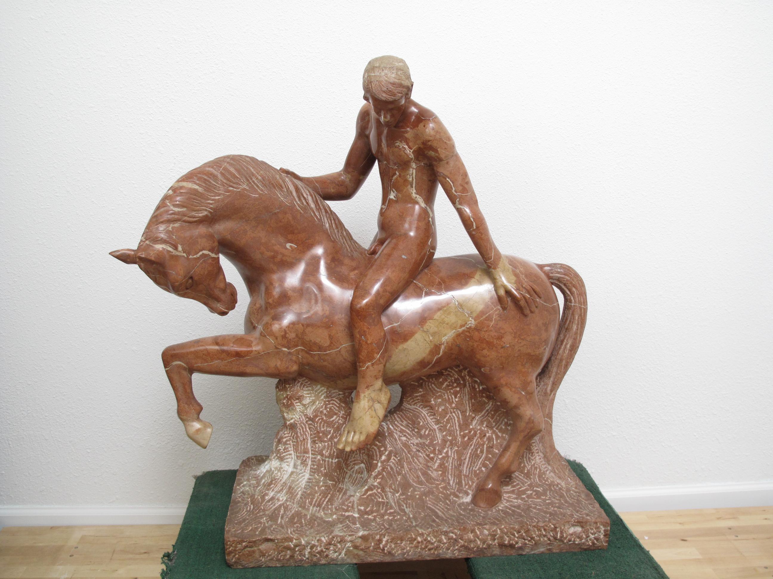Rosso Alicante marble sculpture of Man Upon Horse by Luis Antonio Sanguino titled 