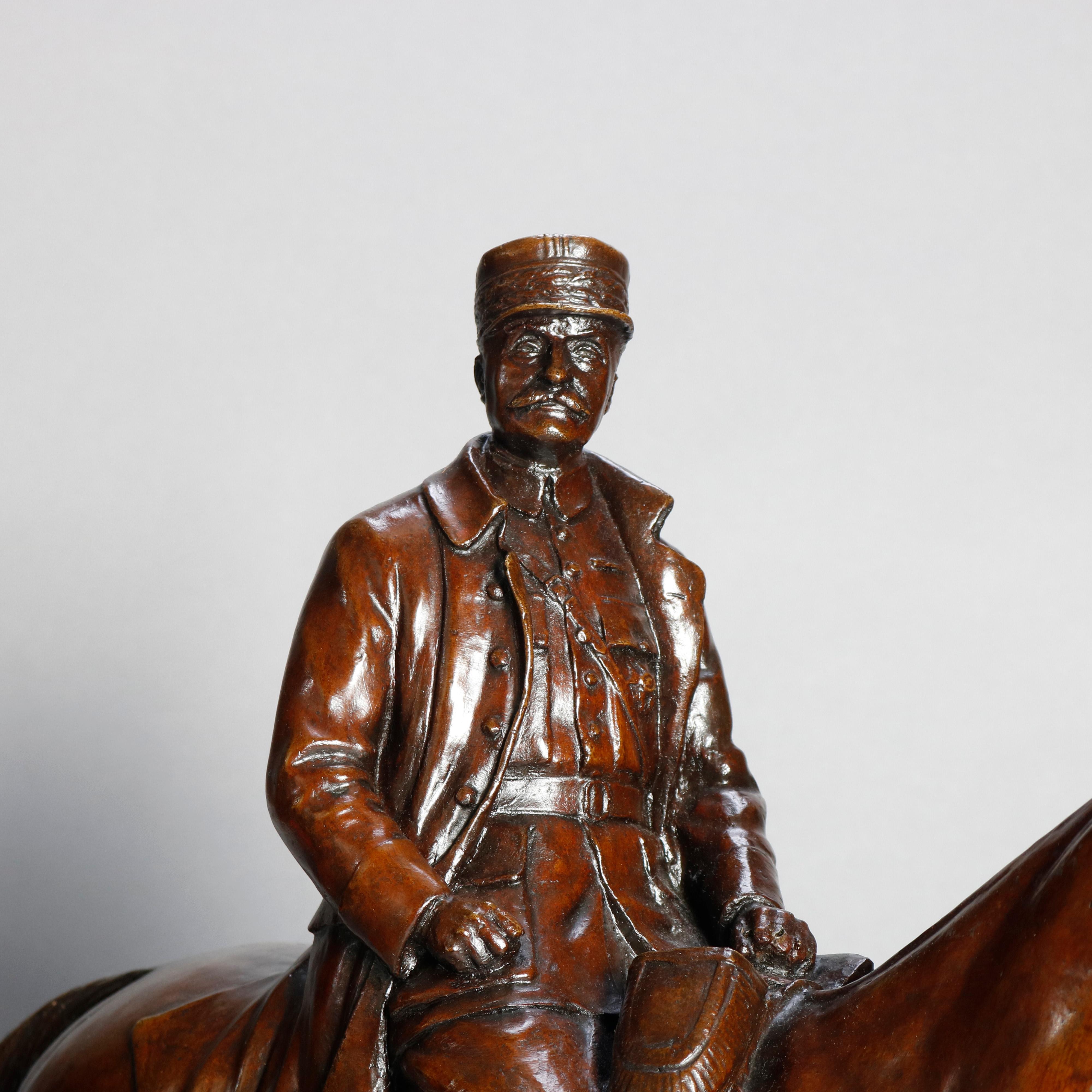 An equestrian portrait bronze depicts Marshal Ferdinand Foch in military uniform and seated on horse back, after Malissard, Valsuani foundry mark as photographed, seated on marble base, circa 1924.

Measures: 22