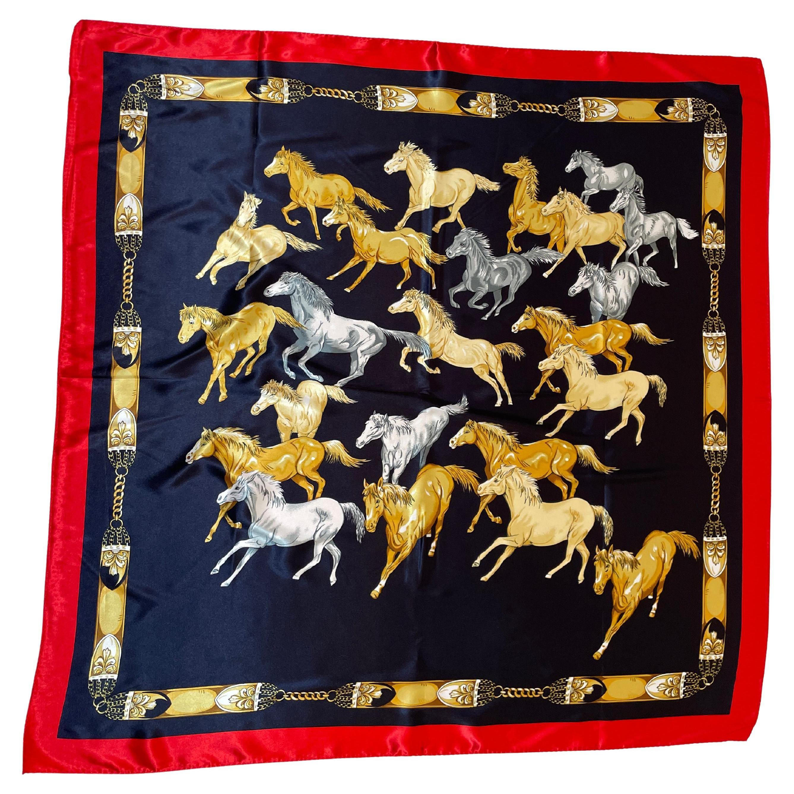 Equestrian silk like polyester scarf with wild Mustangs horses running blue with red borders.
Very large luxury scarf wear it for many purposes, as a scarf, a shawl, a top or anything else you can dream up style wise.
Border with gold chains in