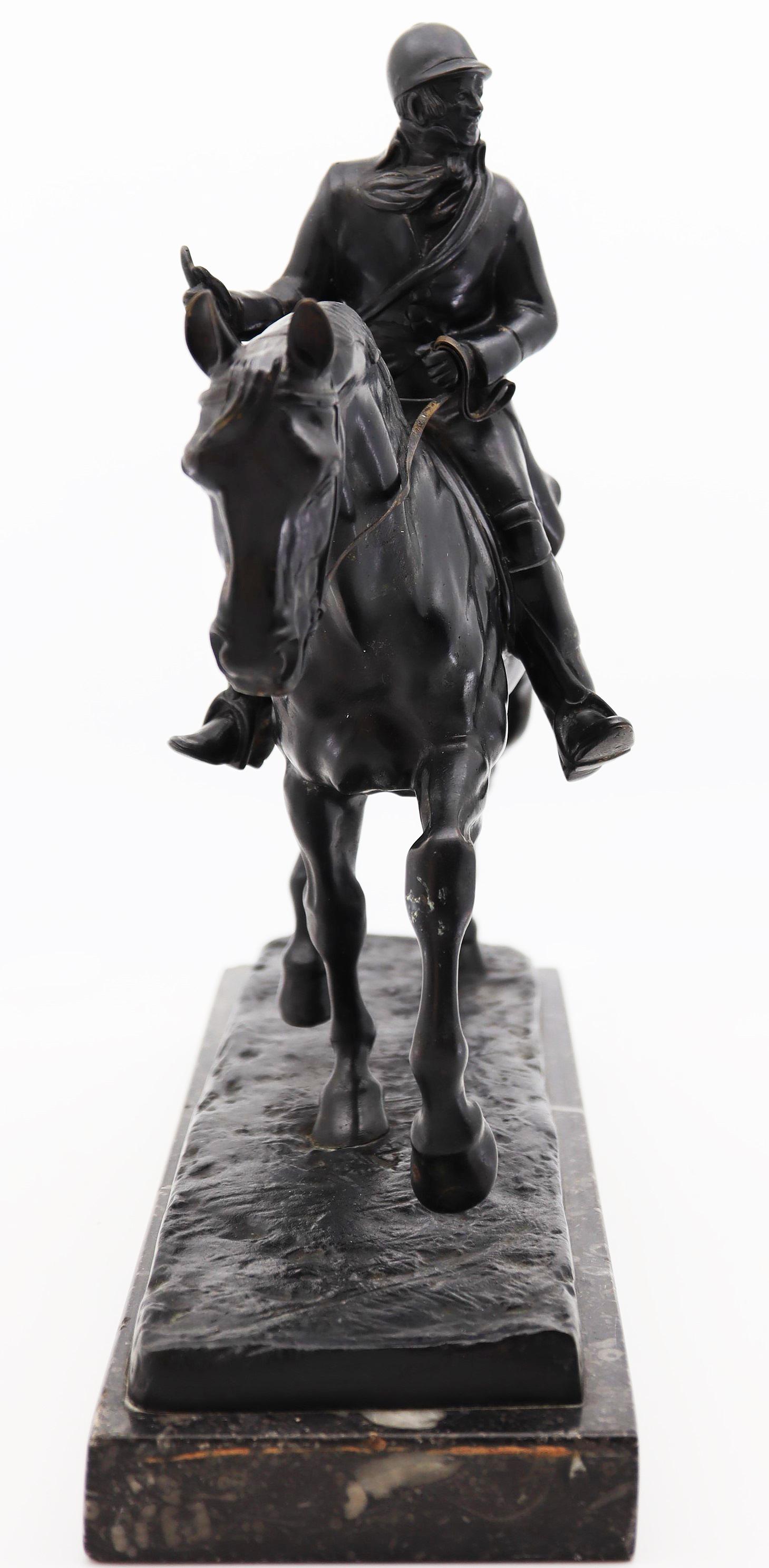 A bronze equestrian late Victorian/Edwardian statue of a huntsman on a riding horse by French animalier sculptor Gaston D’Illiers (1876-1932).
Signed on the lower right “G. d’Illiers” for Gaston D’Illiers. His specialty was to portray equestrian
