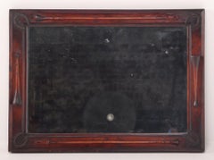 Equestrian themed carved walnut mirror for the horse lover circa 1900.