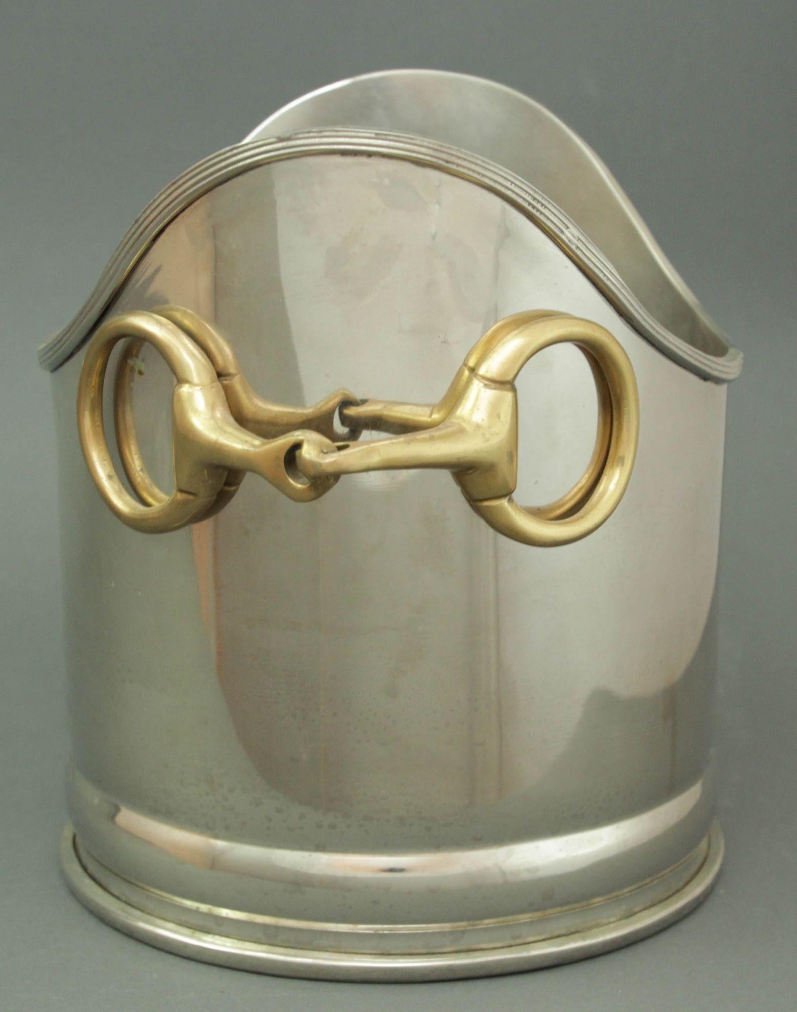 Large Luxury Equestrian Wine Champagne Cooler with brass Horse Bit Handle.
Celebrate the Derby winning with this metal chrome silvered and brass horse bit handle ice bucket.
Western style, great gift for the horse lovers, horse property, equine,