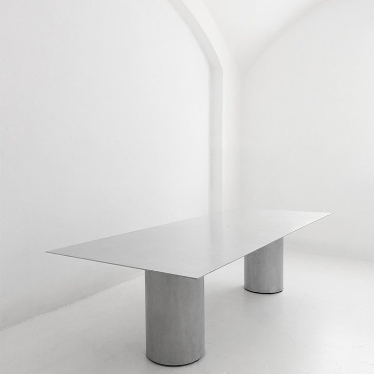 The main feature of the table is the result of its construction, allowing the top a minimum thickness of 6 mm, exploiting the qualities and properties of aluminum.

Materials: Aluminium and stainless steel. Edition: Rossana Orlandi 8 pieces + 1