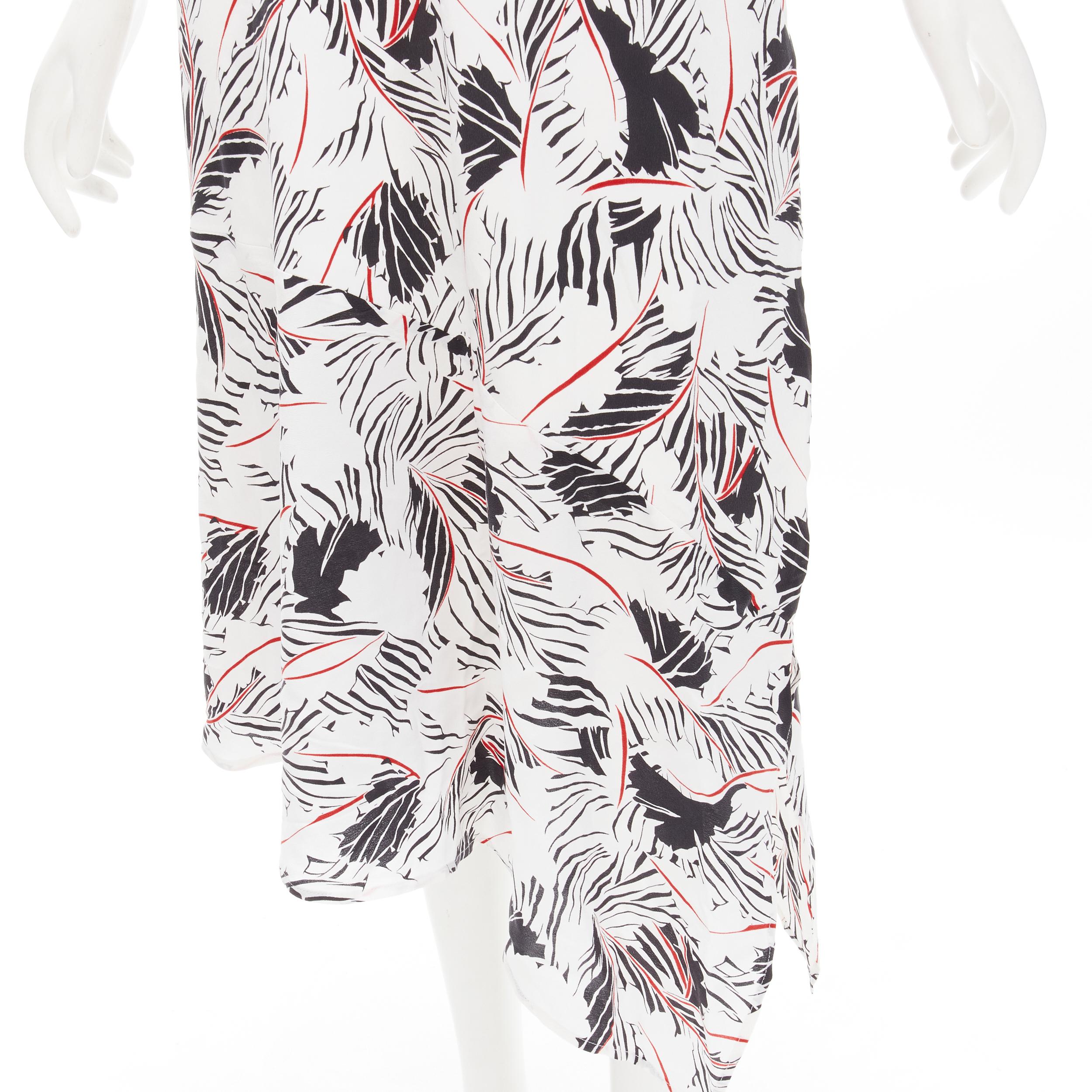 EQUIPMENT FEMME 100% silk white black red graphic print asymmetric slip dress S
Brand: Equipment Femme
Material: 100% Silk
Color: White
Pattern: Abstract
Made in: China

CONDITION:
Condition: Excellent, this item was pre-owned and is in excellent