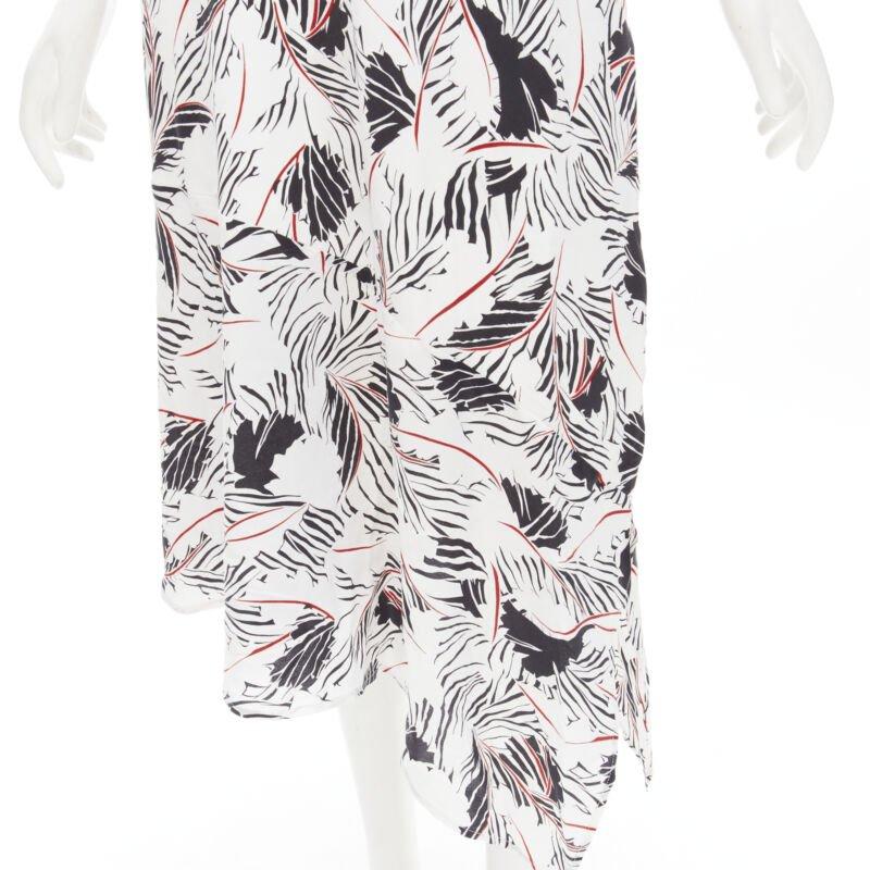 EQUIPMENT FEMME 100% silk white black red graphic print asymmetric slip dress S
Reference: KNLM/A00155
Brand: Equipment
Material: 100% Silk
Color: White, Multicolour
Pattern: Abstract
Lining:  Cotton
Made in: China

CONDITION:
Condition: Excellent,