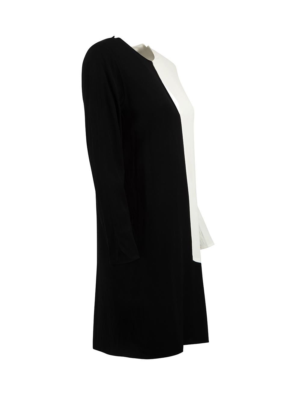 CONDITION is Very good. Hardly any visible wear to this used Equipment Femme designer resale item.



Details


Black & white

Viscose

Mini dress

Long sleeved

White colour block panel

Round neckline

1x Button fastening on the front

Keyhole