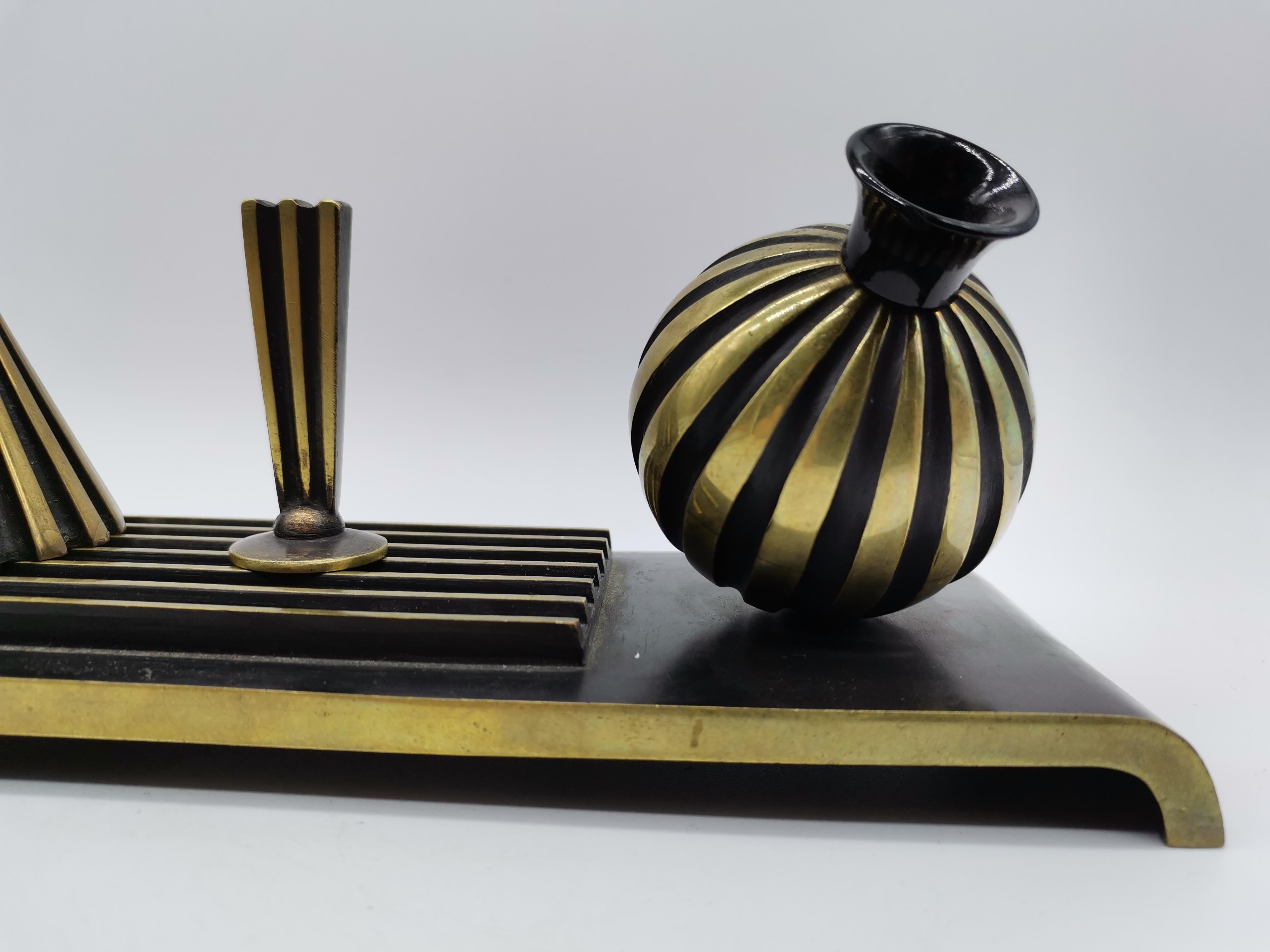 Three pieces of equipment for a reception. Bell, stamp, penholder. By Richard Rohac.