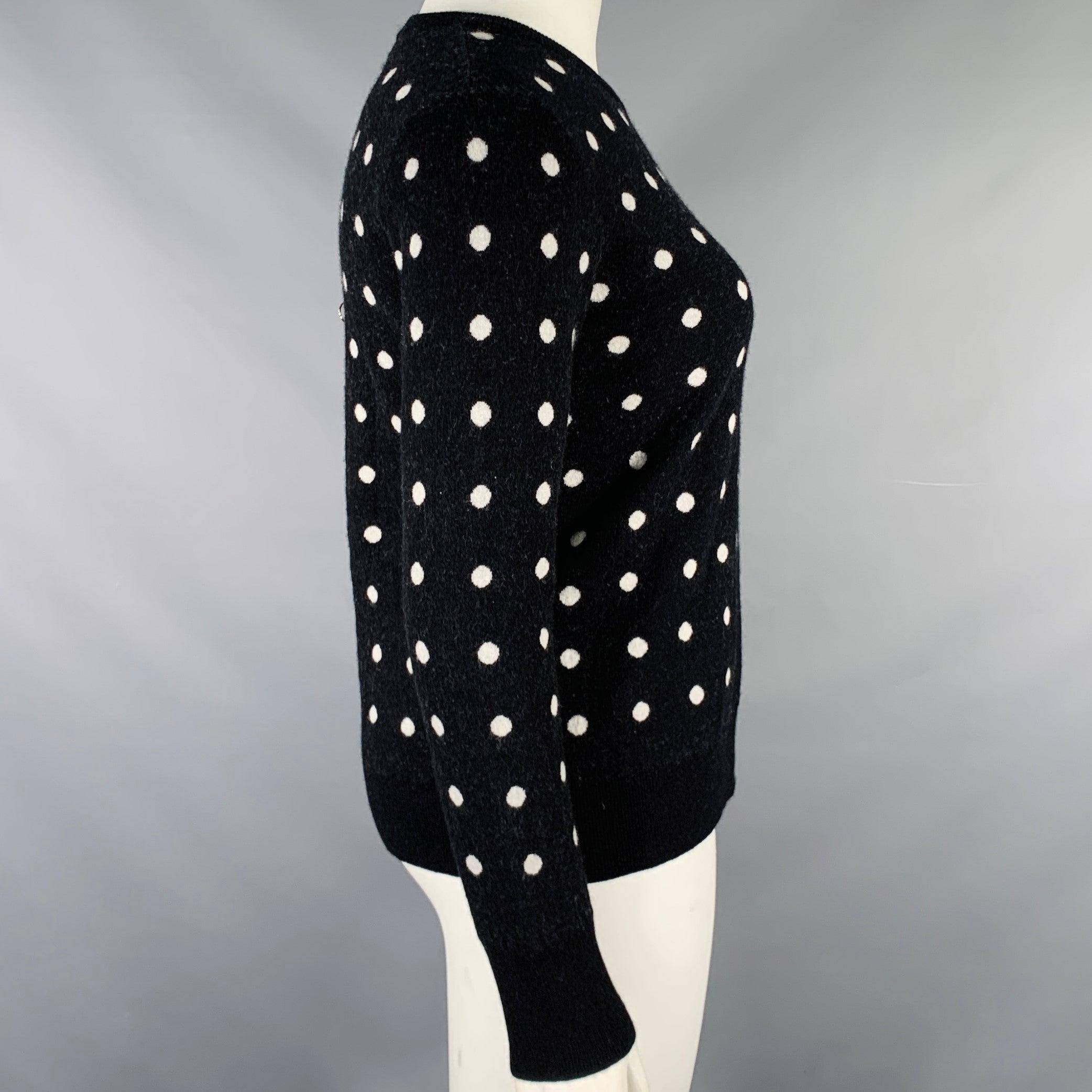EQUIPMENT pullover
in a black and white wool blend knit featuring a polka dot pattern, long sleeves, and crew neck. Excellent Pre-Owned Condition. 

Marked:   L 

Measurements: 
 
Shoulder: 16.5 inches Bust: 38 inches Sleeve: 24.5 inches Length: 23