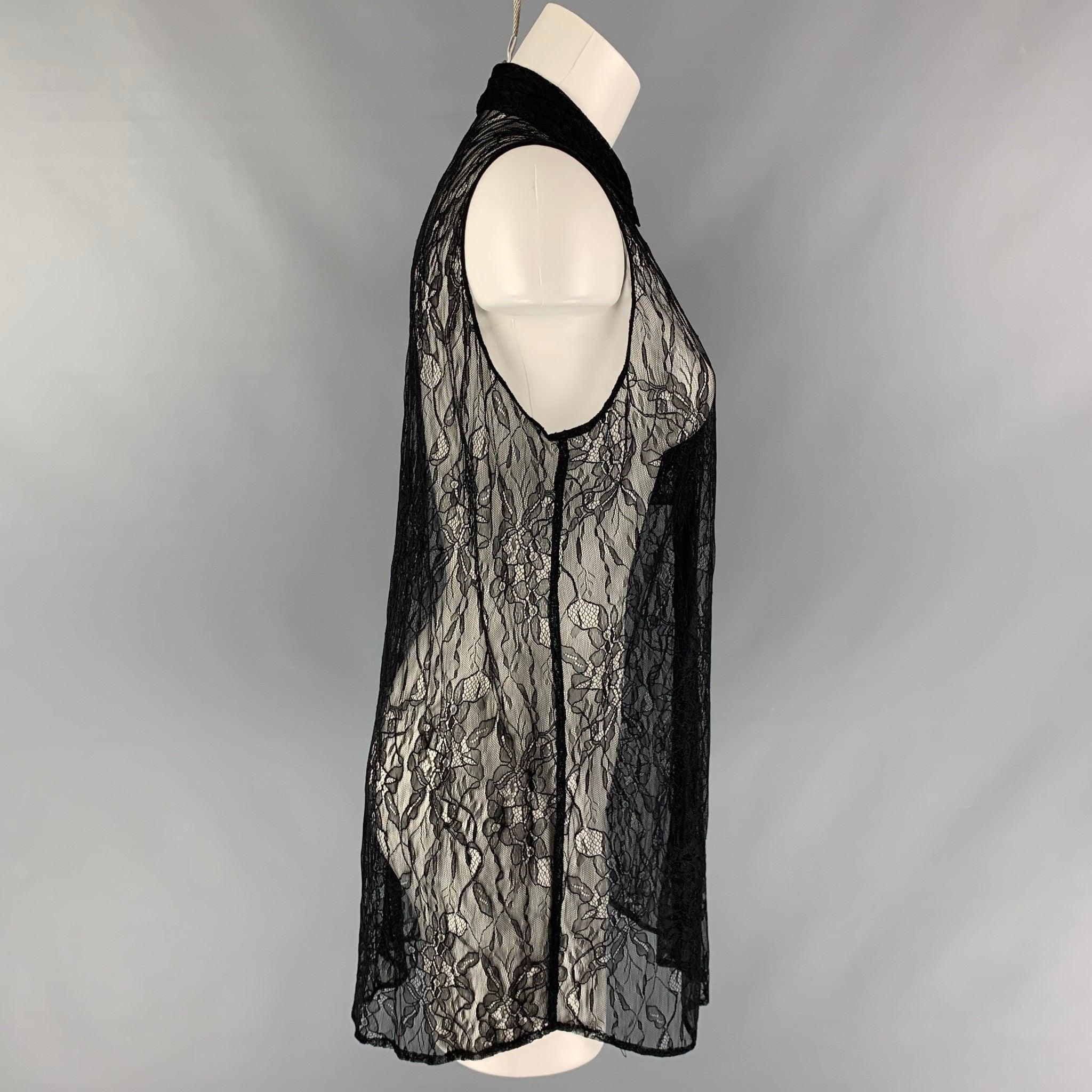 EQUIPMENT sleeveless blouse comes in black lace fabric featuring button down closure at front and classic collar. Very Good Pre-Owned Condition. Fabric Tags Removed. 

Marked:   M 

Measurements: 
 
Shoulder: 13 inBust: 46 inLength: 32 in
  
  

