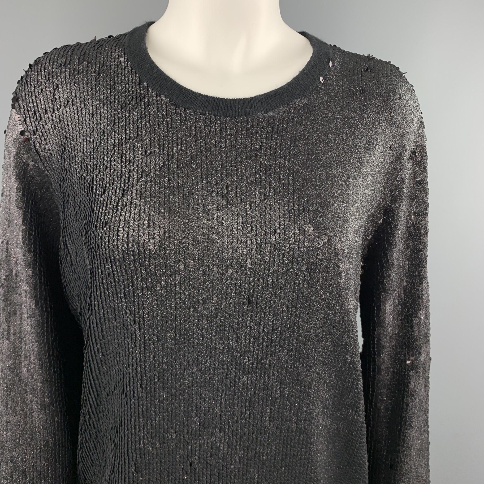 EQUIPMENT FEMME pullover sweater comes in light weight viscose blend knit with a crewneck and all over sparkle sequin. 

Very Good Pre-Owned Condition.
Marked: S

Measurements:

Shoulder: 16 in.
Chest: 40 in.
Sleeve: 28 in.
Length: 27 in.