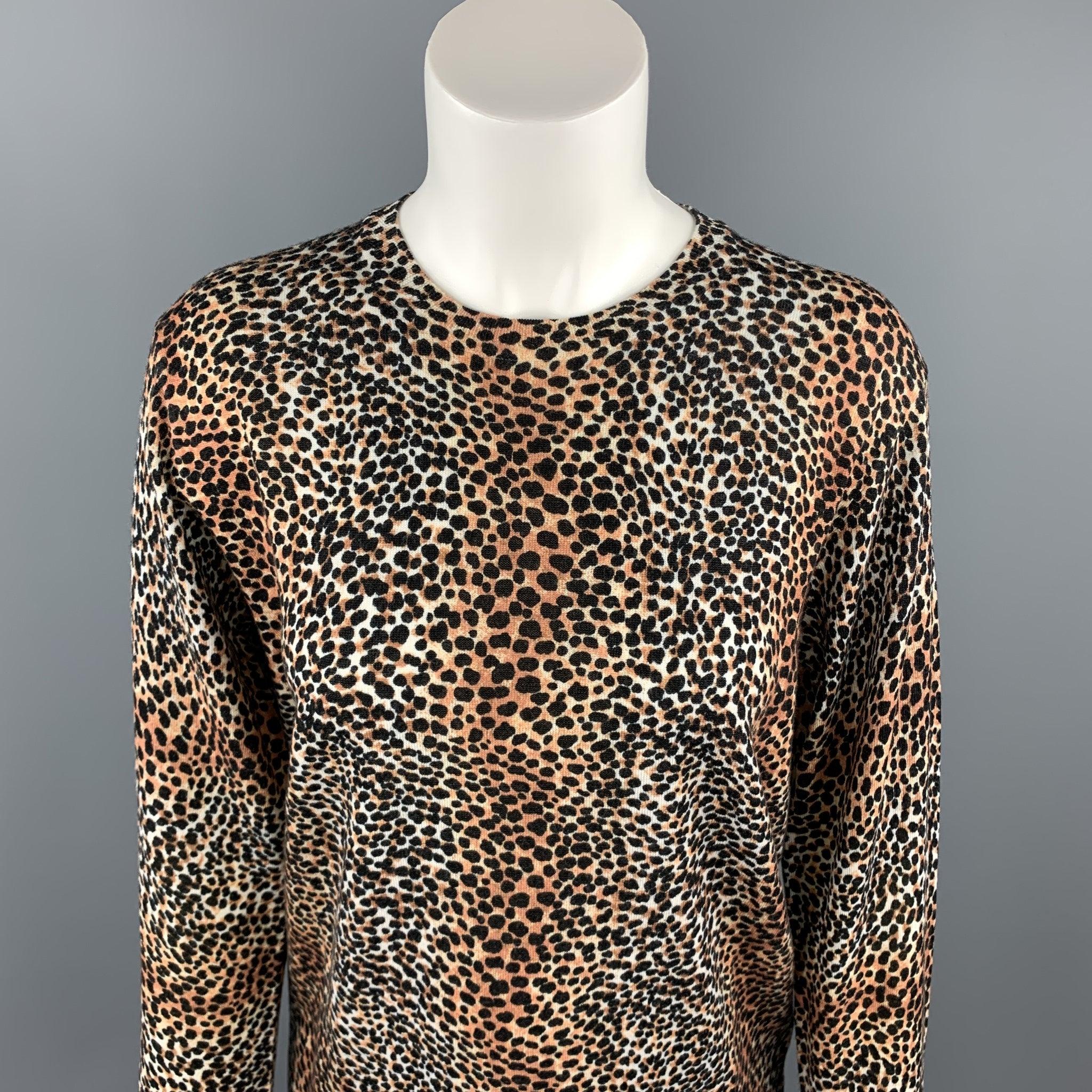 EQUIPMENT FEMME pullover comes in a black & tan cheetah print wool featuring a crew-neck.
New With Tags. 

Marked:   XS/TP
 

Measurements: 
 
Shoulder: 17 inches 
Bust: 38 inches 
Sleeve: 24 inches 
Length: 24.5 inches 
  
  
 
Reference: