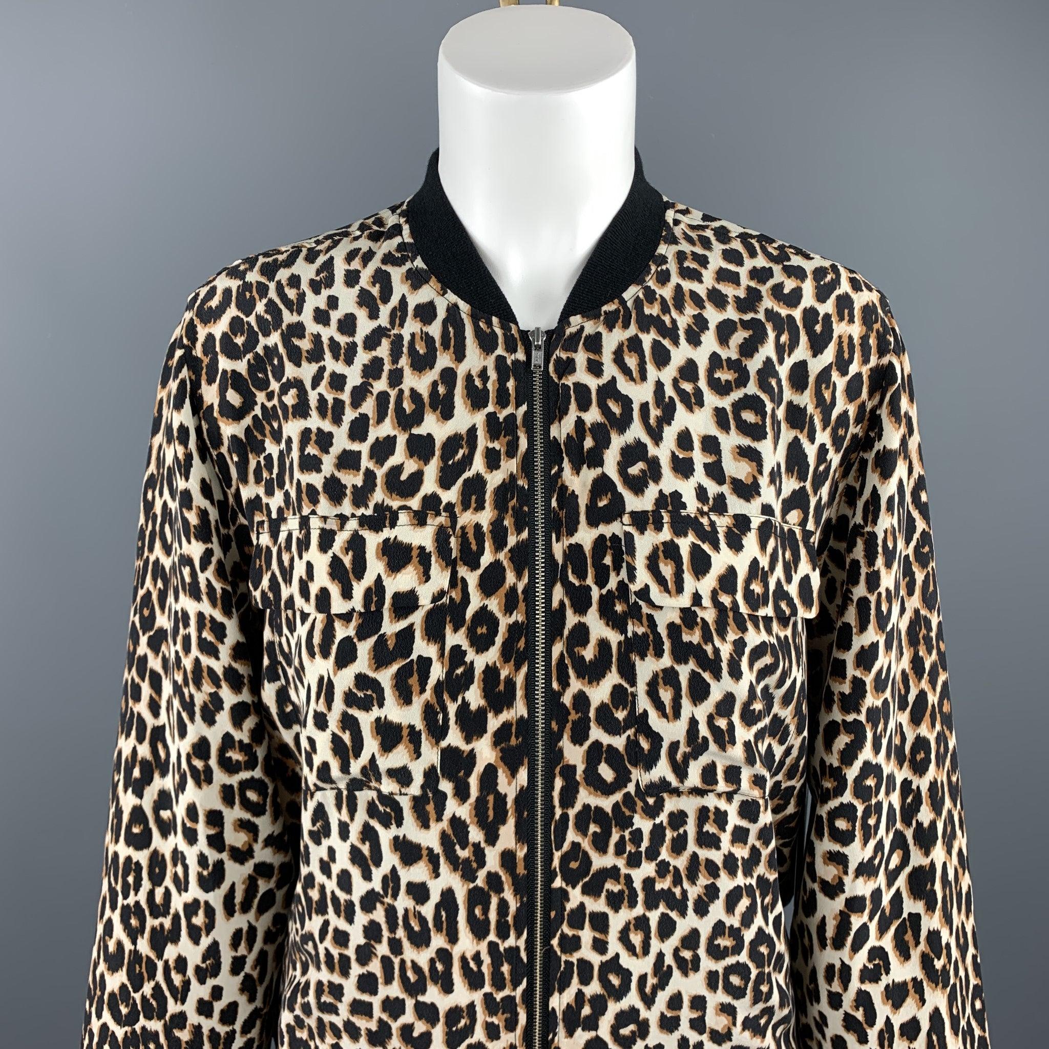 EQUIPMENT FEMME jacket comes in a black & tan leopard silk featuring a bomber style, patch pockets, and a zip up closure. Excellent Pre-Owned Condition. 

Marked:   XS 

Measurements: 
 
Shoulder: 16 inches 
Bust: 36 inches 
Sleeve: 24.5 inches