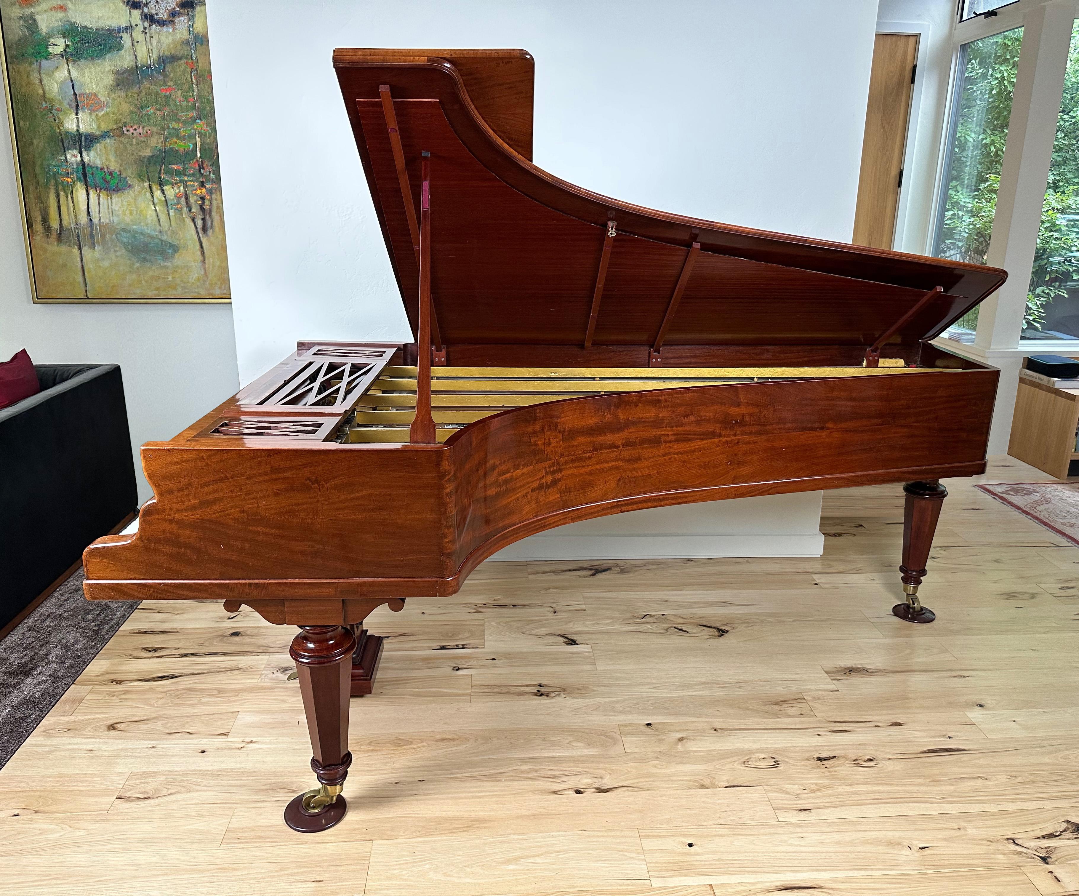 This Erard parallel-strung grand piano, crafted in Paris in 1845, has been extraordinarily well-tended, restored and maintained, enduring today as not only a spectacular example of the pinnacle of 19th Century piano design - characterized by its