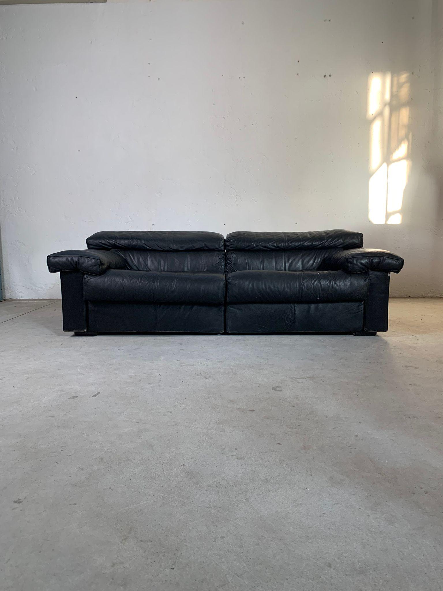 Erasmo leather sofa by Tobia Scarpa for B&B Italia, 1960s
Modular sofa model Erasmo, consisting of two armchairs. Upholstered in black leather, signs of time are highlighted in the photos.
 Designed by Afra and Tobia Scarpa and produced in the 1960s