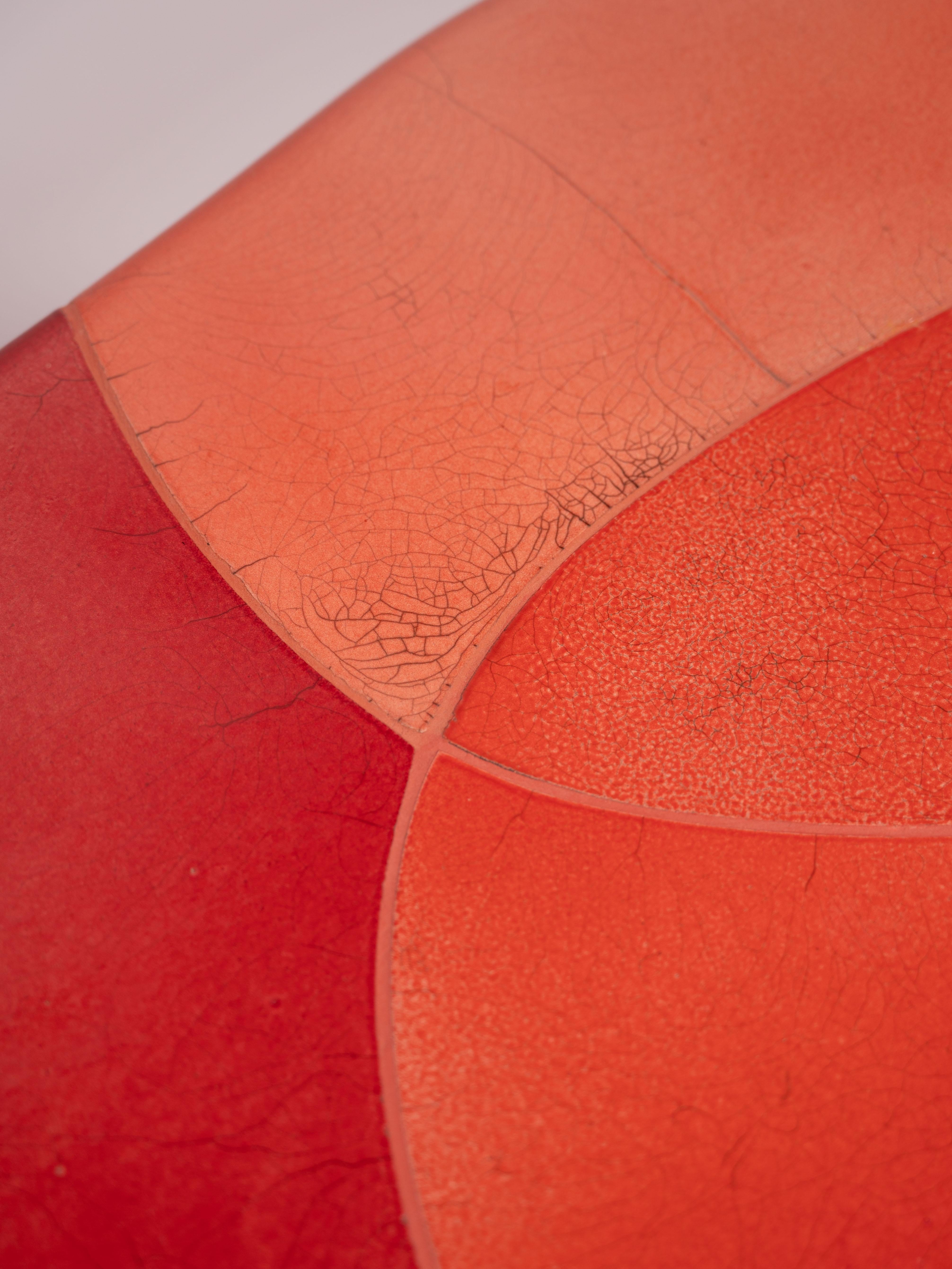 Erba, a ceramic coffee table which reveals organic curves. 
The Raku technique plays with chance by revealing irregular patterns in a glowing color.

Coffee table
Raku-glazed ceramic and wooden frame
H43 x 84 cm x 77 cm
Top thickness 4 cm
Made is