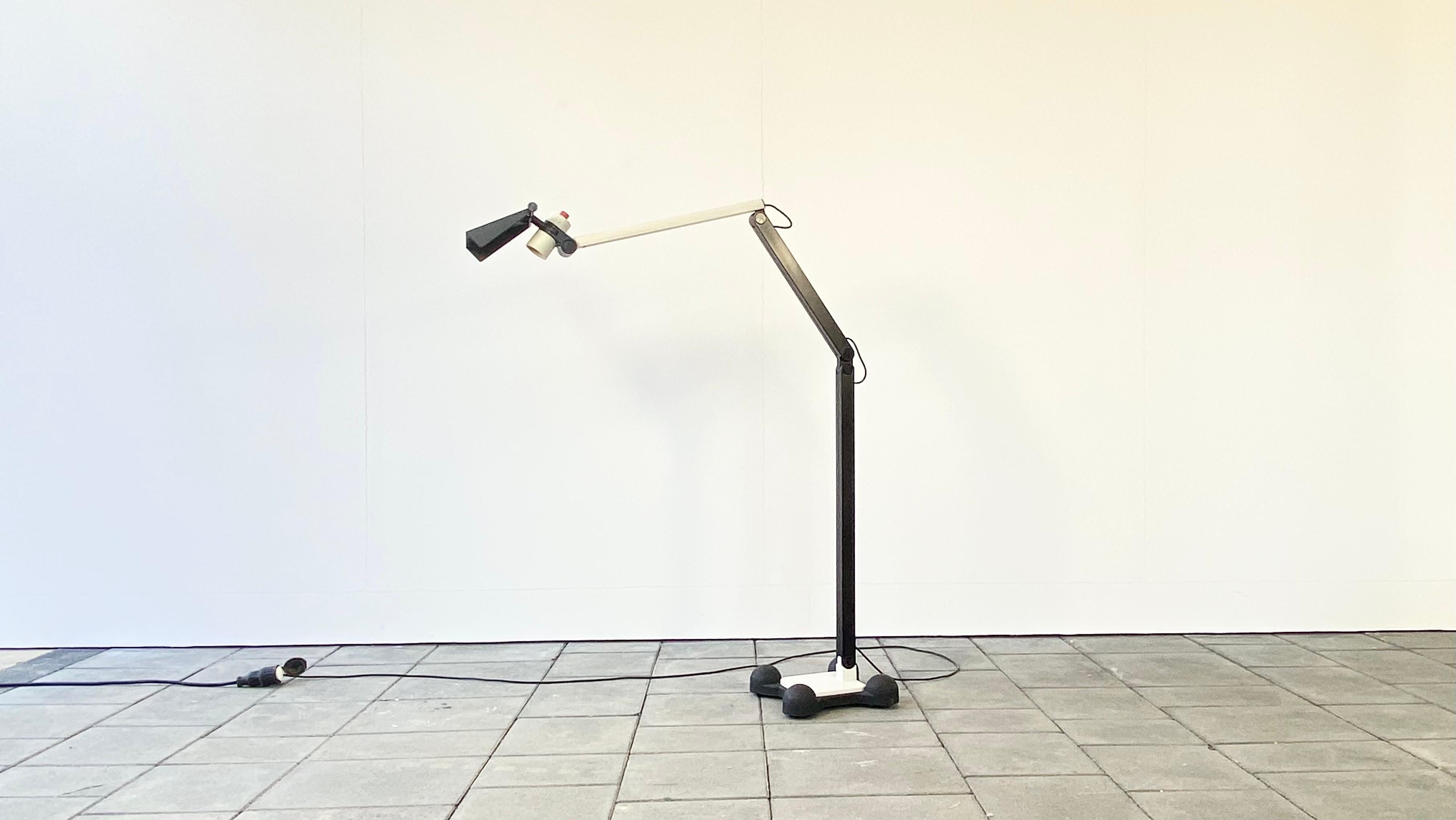 Erco floor lamp, designed by Ettore Sottsass in 1973.

A wonderful example of the pre-postmodern lighting is this rare floor lamp, designed by ettore Sottsass for Erco.

The design already shows various of Sottsass formal and esthetic principals