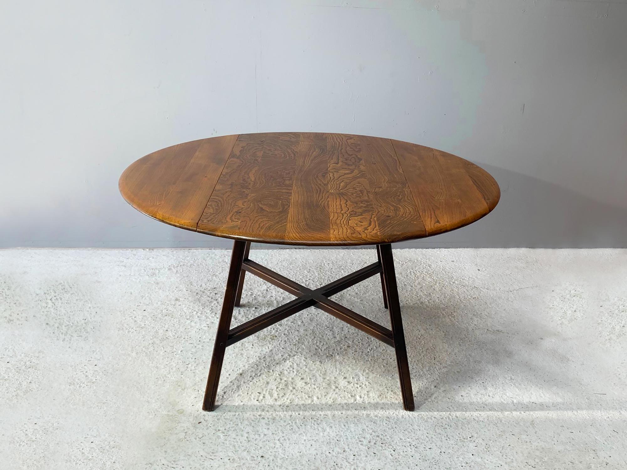 British Ercol 1950’s ‘Old Colonial 377”  blue label drop leaf table For Sale