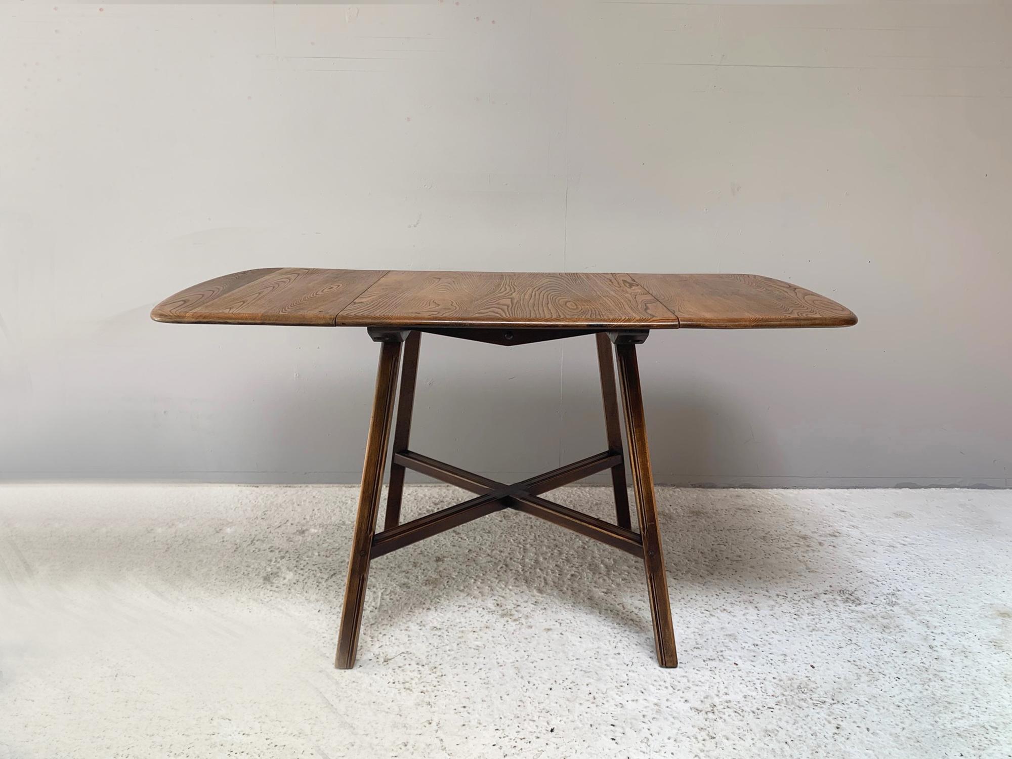Mid-Century Modern Ercol 1950’s ‘Old Colonial 377”  blue label drop leaf table For Sale