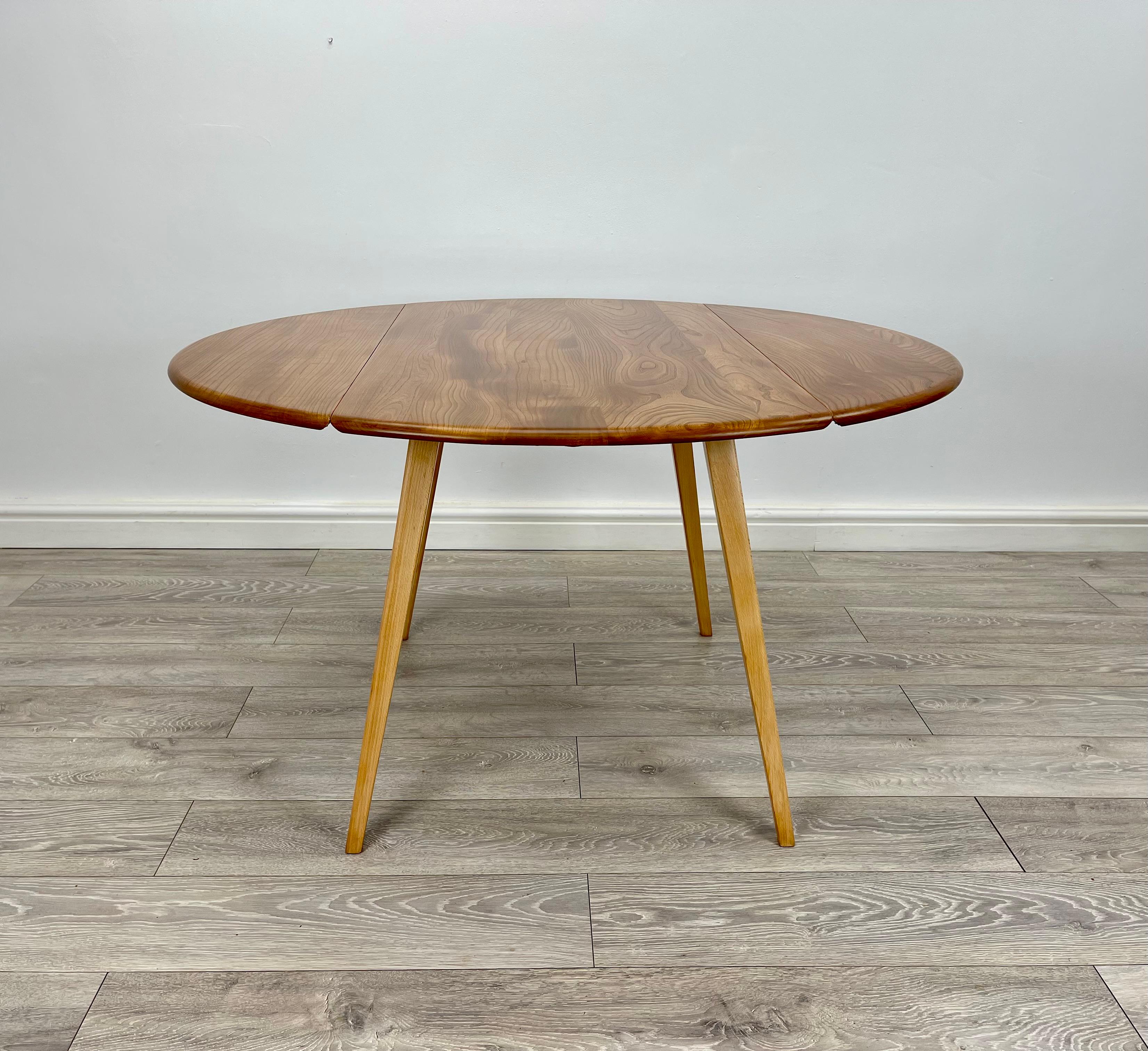Mid-Century Modern Ercol blonde drop leaf dining table  For Sale