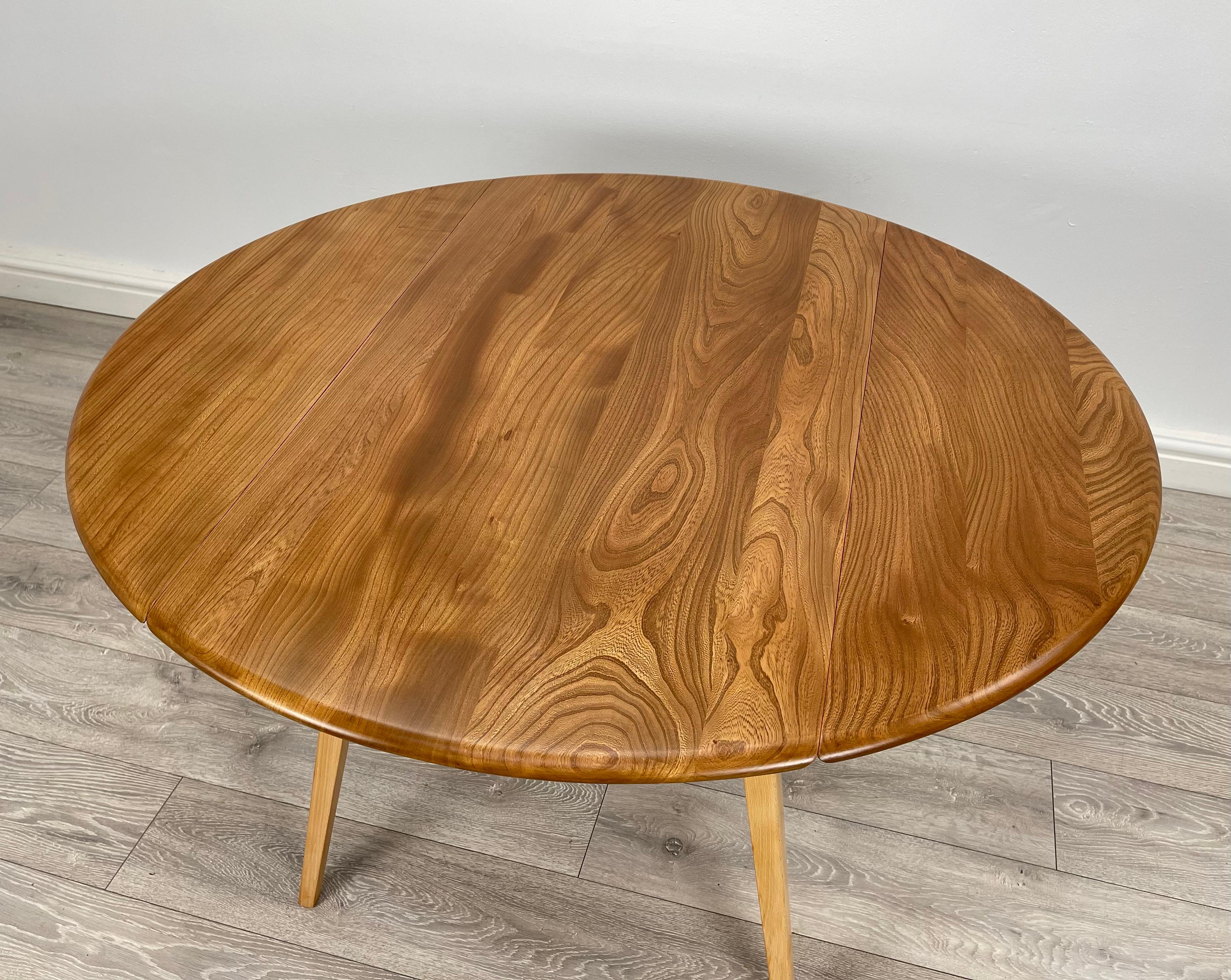 British Ercol blonde drop leaf dining table  For Sale
