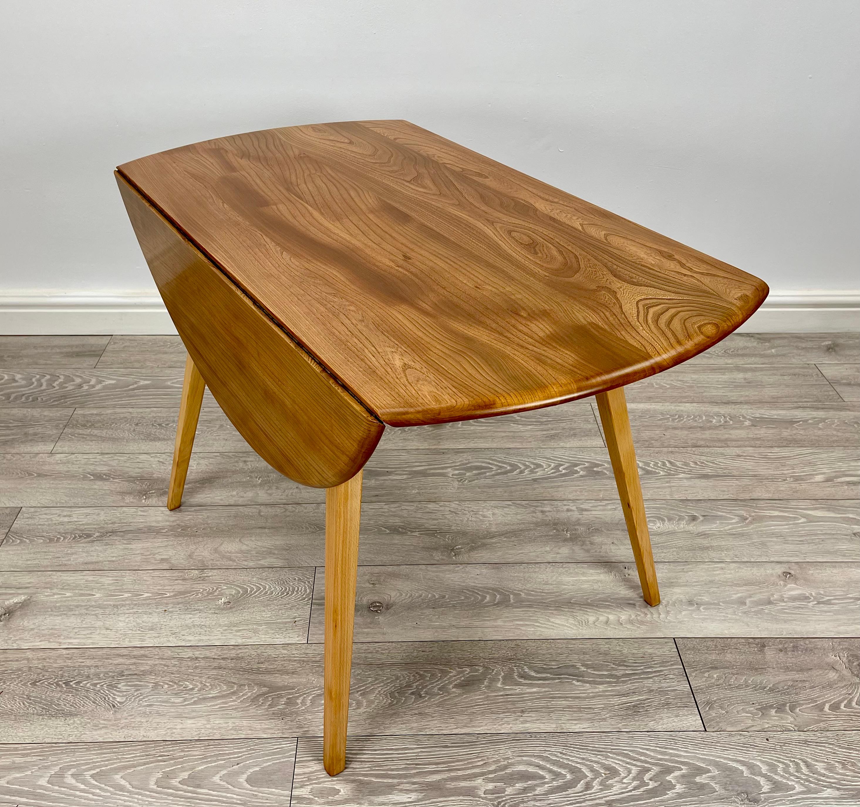 20th Century Ercol blonde drop leaf dining table  For Sale