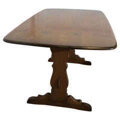 Table de réfectoire Ercol Golden Elm  C'est une pièce superbe, c'est une bonne qua