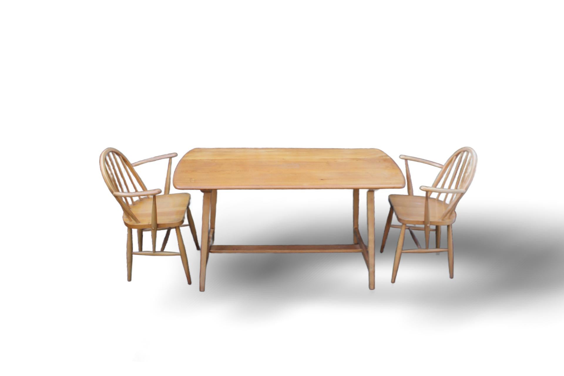 Mid-20th Century Ercol Plank Table and hoop chairs