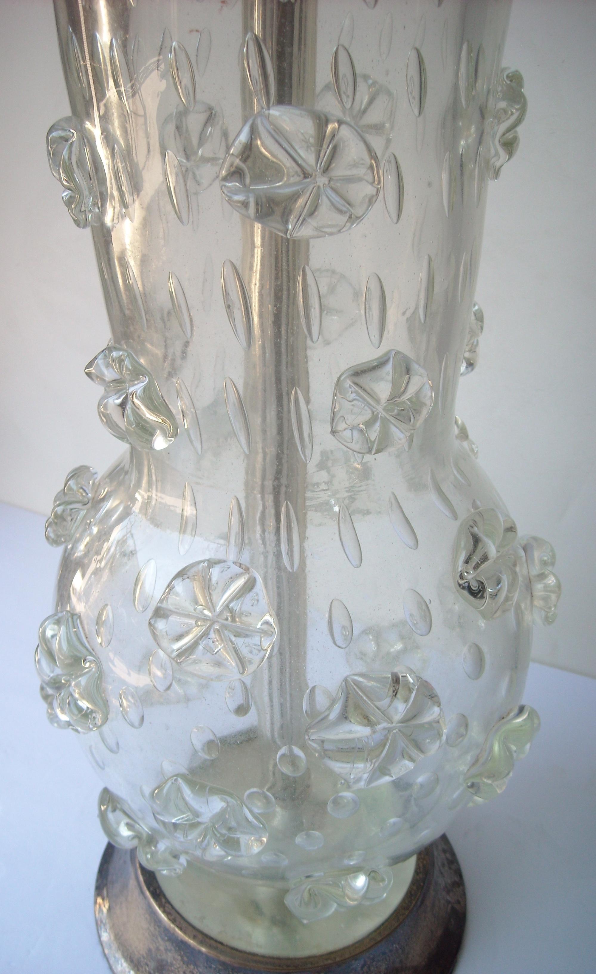 This is a rare and early Murano lamp by the well known artist Ercole Barovier. The glass alone measures approximate, 16