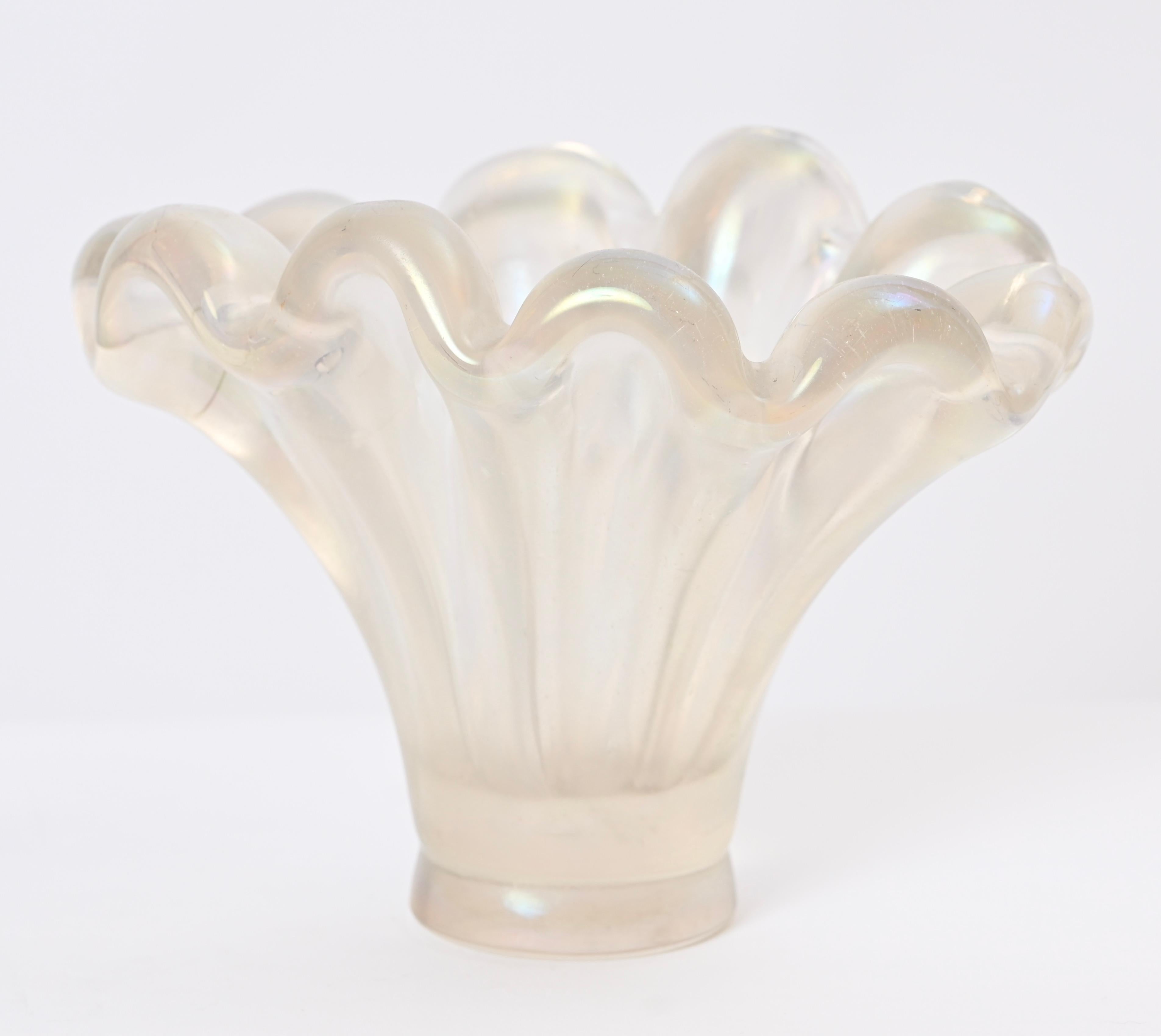 A stunning vase from one of the masters of Murano glass production, Ercole Barovier. Produced in 1942, this vase was produced from the series 'a grosse costolature'. Typical of Barovier's early work, this beautiful, milky white glass shimmers in a