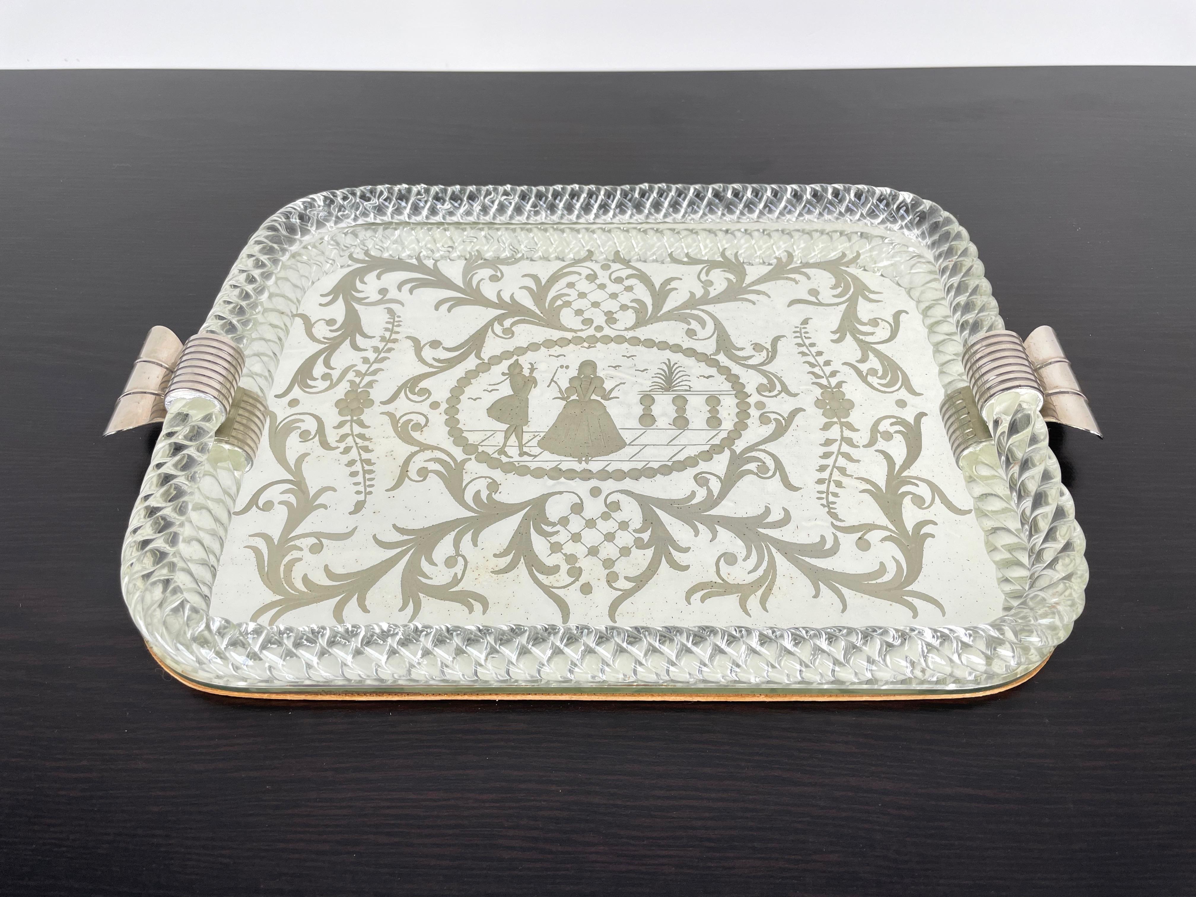 Rectangular mirror-engraved Murano glass serving tray. This wonderful piece was produced in Italy during 1940s by the master Murano glass-maker Ercole Barovier. This wonderful item is a peculiar Venetian vintage tray with a mirror base and silver