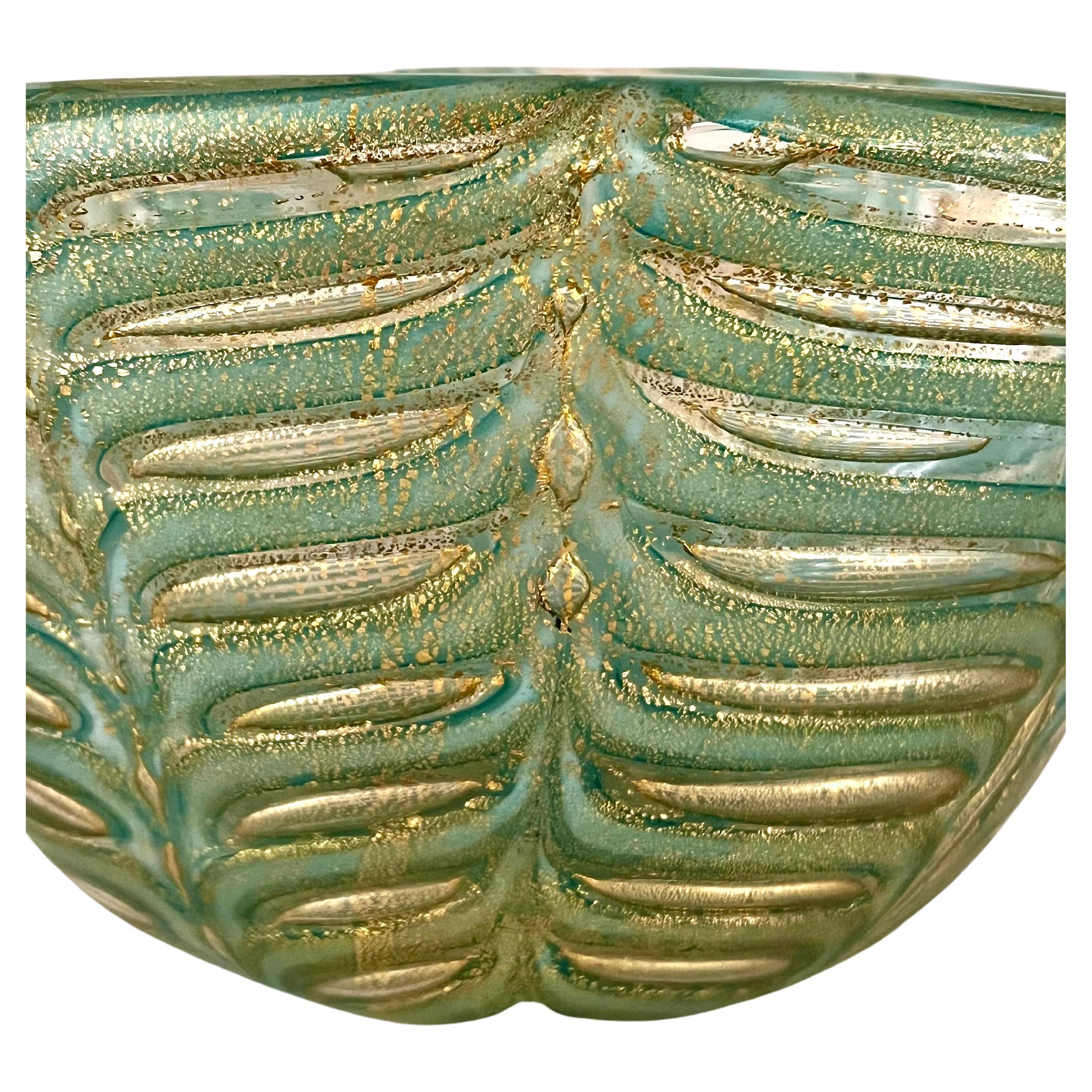 Stunning Green and Gold Leaf Murano Glass Bowl or Vase by Ercole Barovier.  With pure gold leaf this hand blown bowl sculpture is so beautiful in the Graffito technique due to the gold inclusions. And the master himself!
Perfect for consoles, coffee
