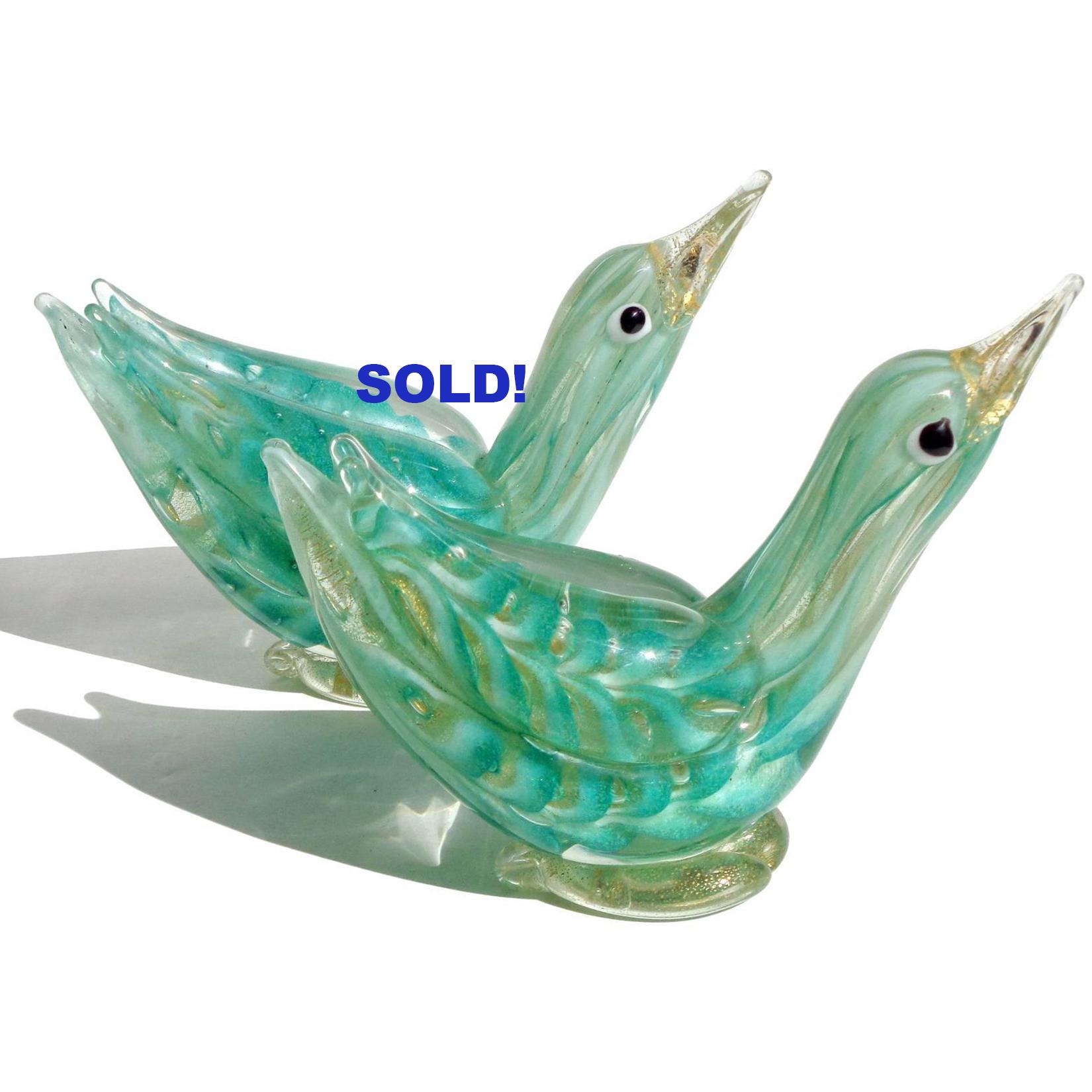 Only 1 Left. Beautiful and rare Murano hand blown green and gold flecks Italian art glass bird sculpture. Documented to designer Ercole Barovier for Barovier e Toso, circa 1960s. Created in the 