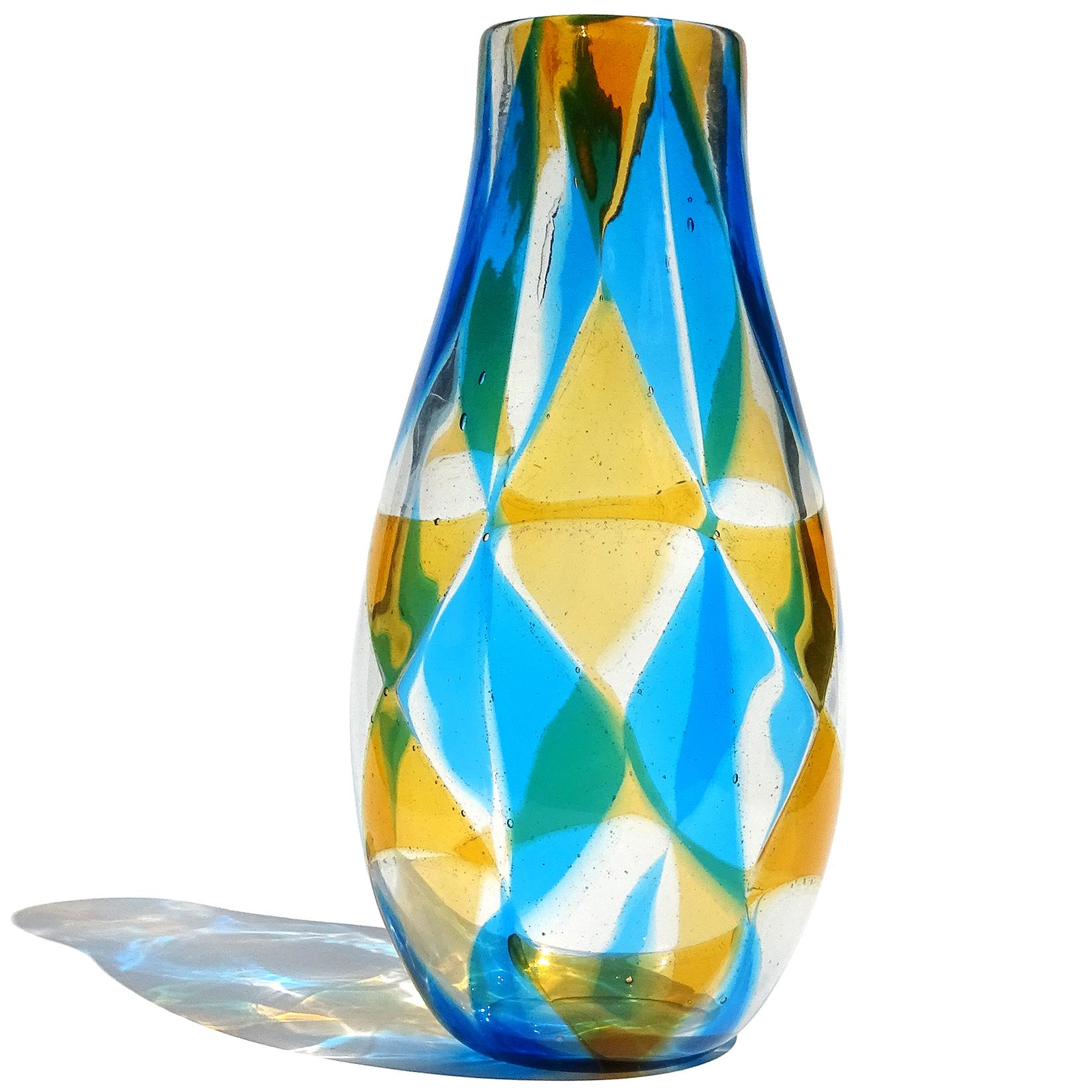 Rare Murano hand blown orange, blue and clear triangle Tessere mosaic Italian art glass flower vase. Documented to designer Ercole Barovier, for Barovier e Toso, circa 1961-1967 in the 