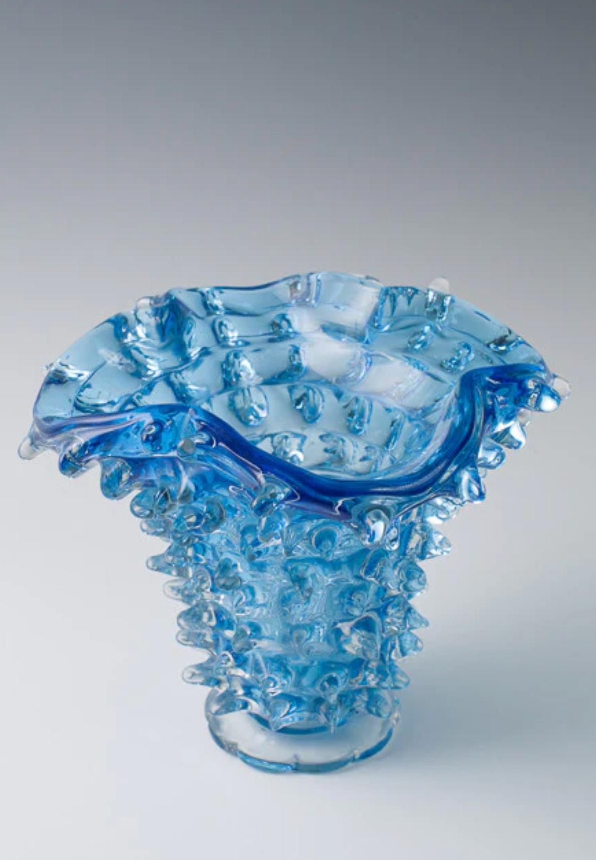Ercole Barovier (1889-1974), 'Rostrato' vase, ca. 1960
blue glass with applications
produced by Barovier & Toso, Murano, Italy

LITERATURE
This and similar works are referenced in the following:
M. Barovier, Art of the Barovier. Glassmakers in