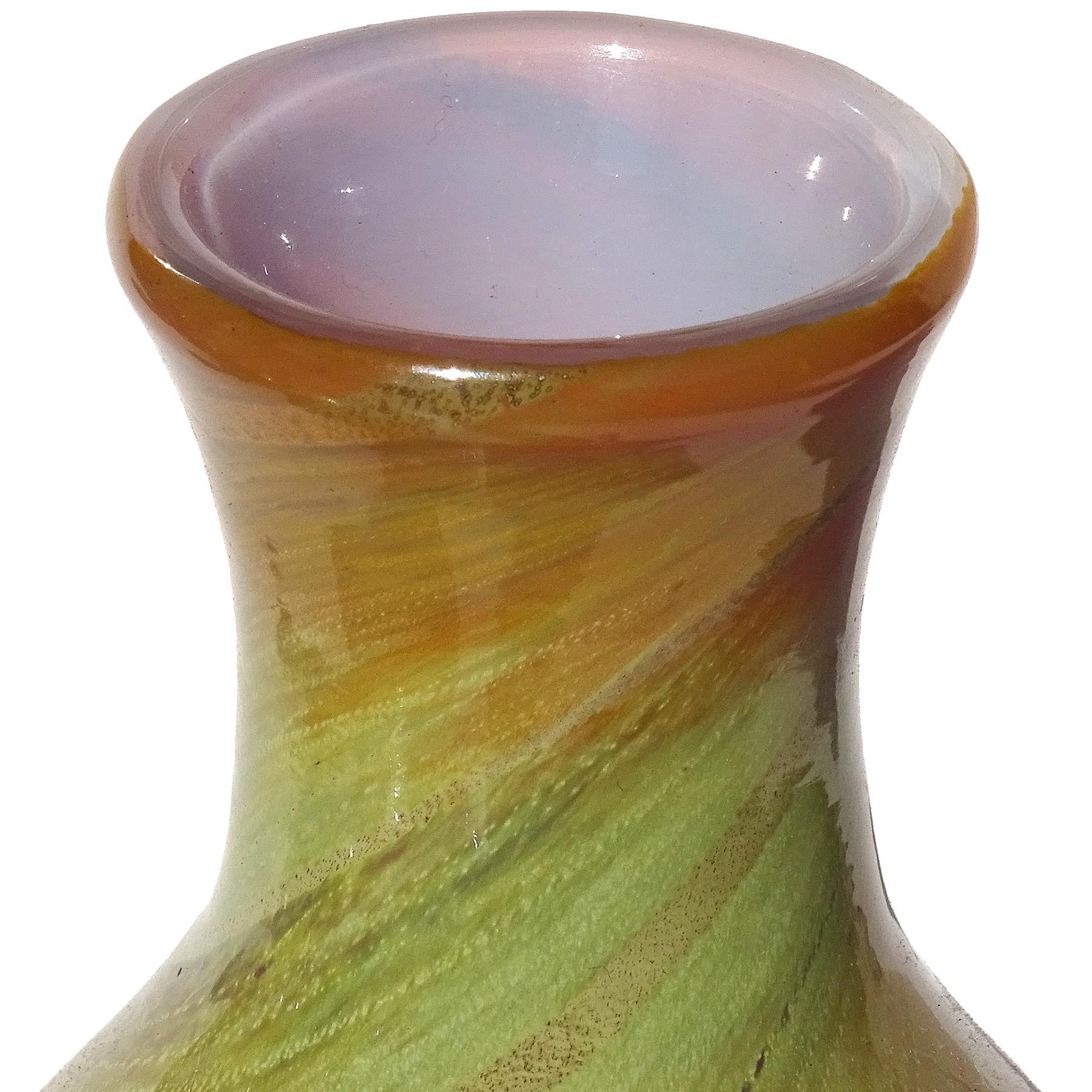 Beautiful and rare, vintage Murano hand blown opalescent and silver flecks Italian art glass flower vase. Documented to designer Ercole Barovier, for the Barovier and Toso company, circa 1956. It is signed underneath 