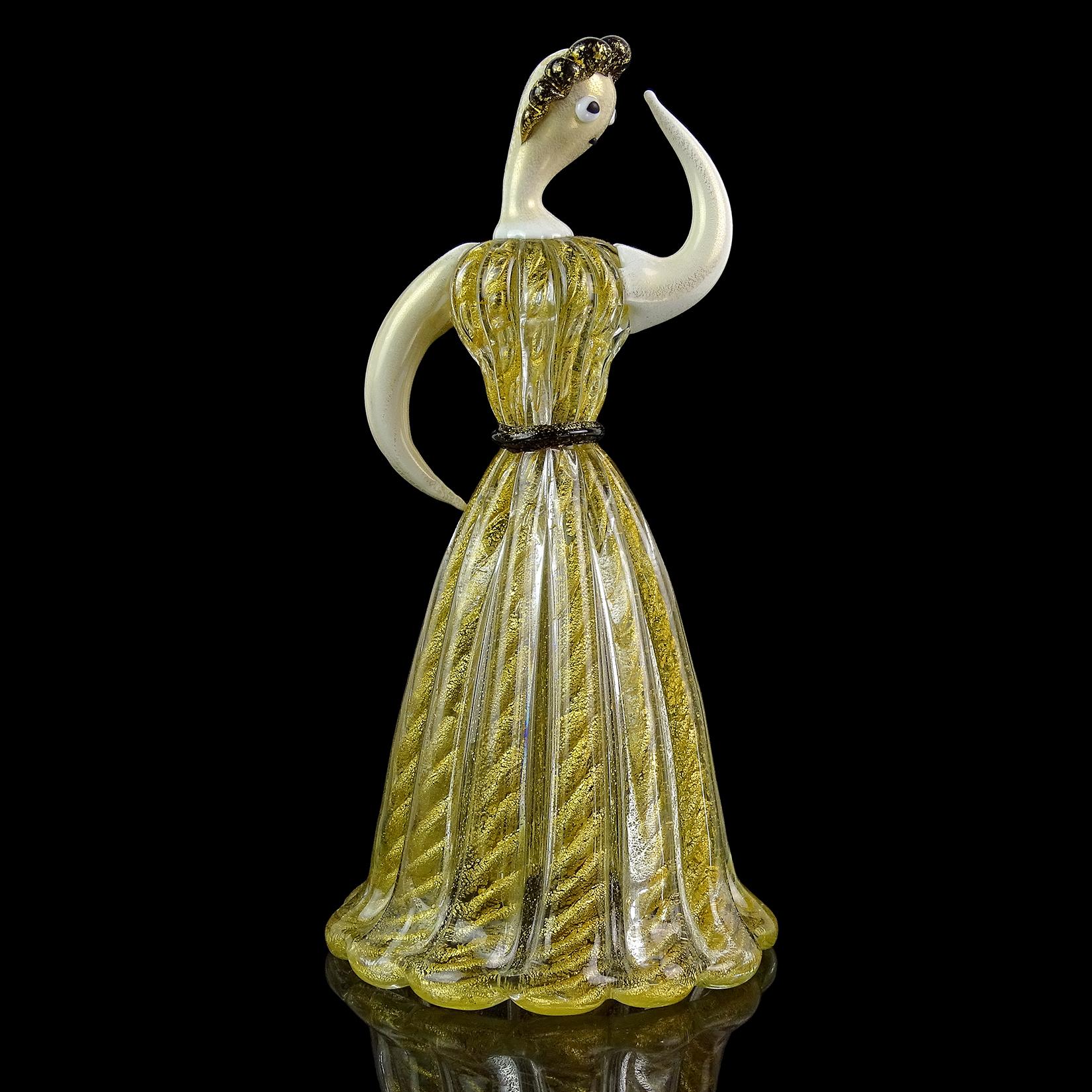 Beautiful and rare, vintage Murano hand blown white glass, black accents and gold flecks Italian art glass woman sculpture. Documented to designer Ercole Barovier for Barovier e Toso. The figure is made with white 
