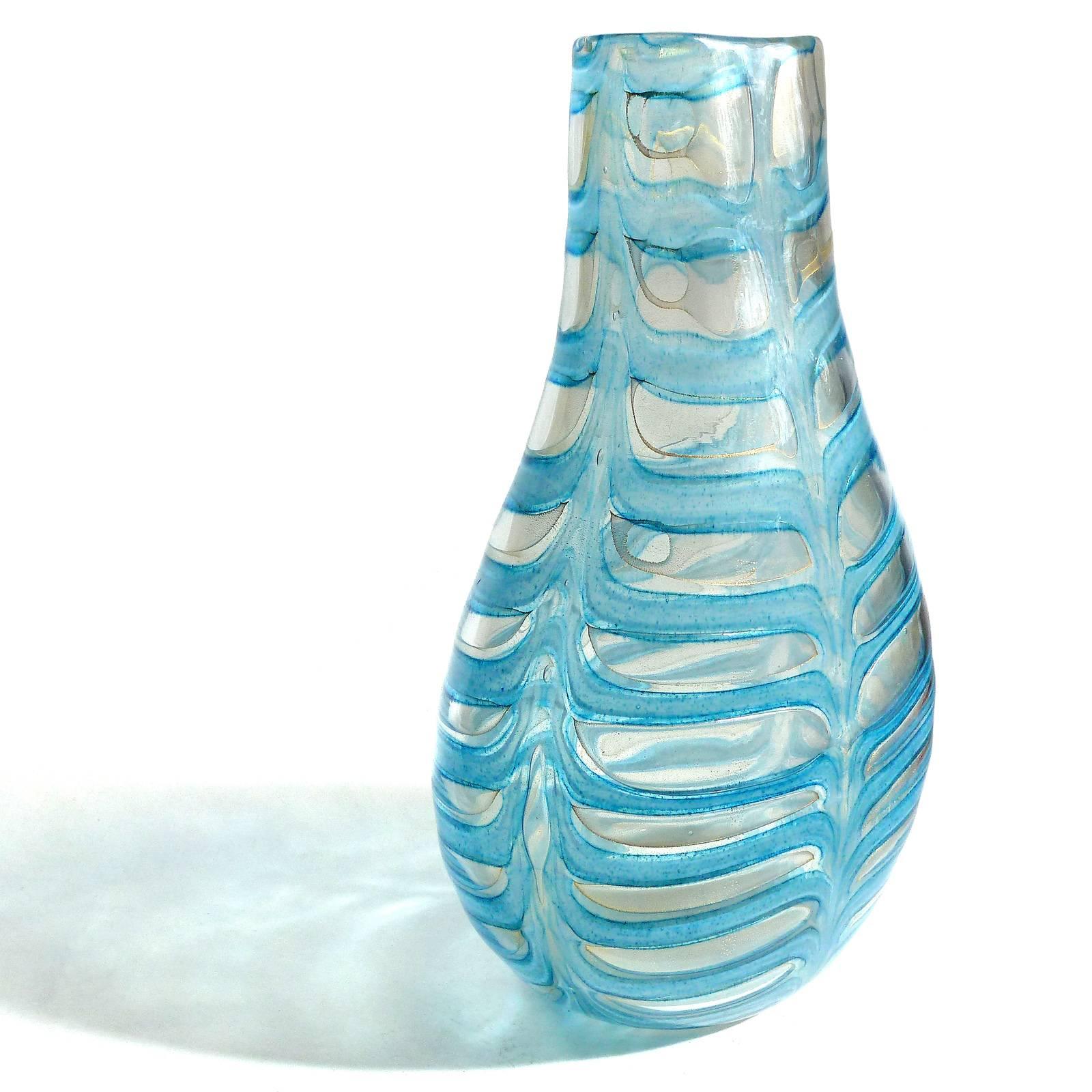 Gorgeous, and very rare, vintage Murano hand blown blue pulled feather design and gold flecks Italian art glass flower vase. Documented to designer Ercole Barovier for the Barovier e Toso Company, circa 1969. The design is called 