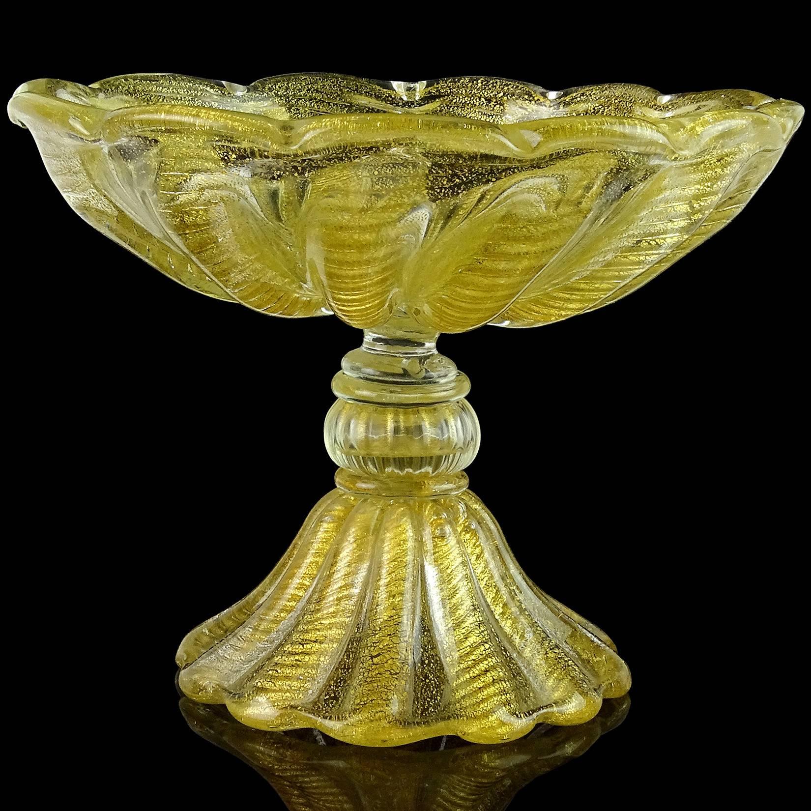 Murano handblown gold flecks Italian art glass compote footed bowl. Documented to designer Ercole Barovier for Barovier e Toso. The piece has a ribbed design with ropes of gold, 