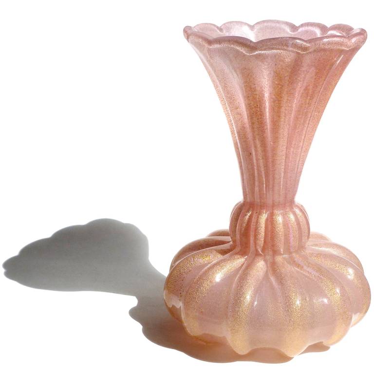 Beautiful Murano hand blown pink and gold flecks Italian art glass ribbed body flower vase. Documented to designer Ercole Barovier for Barovier e Toso, in the 