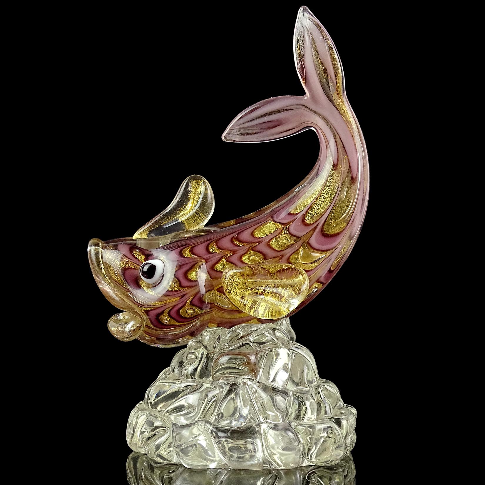 Beautiful and rare Murano hand blown purple with gold flecks Italian art glass fish sculpture. Documented to designer Ercole Barovier, for Barovier e Toso. Created in the 