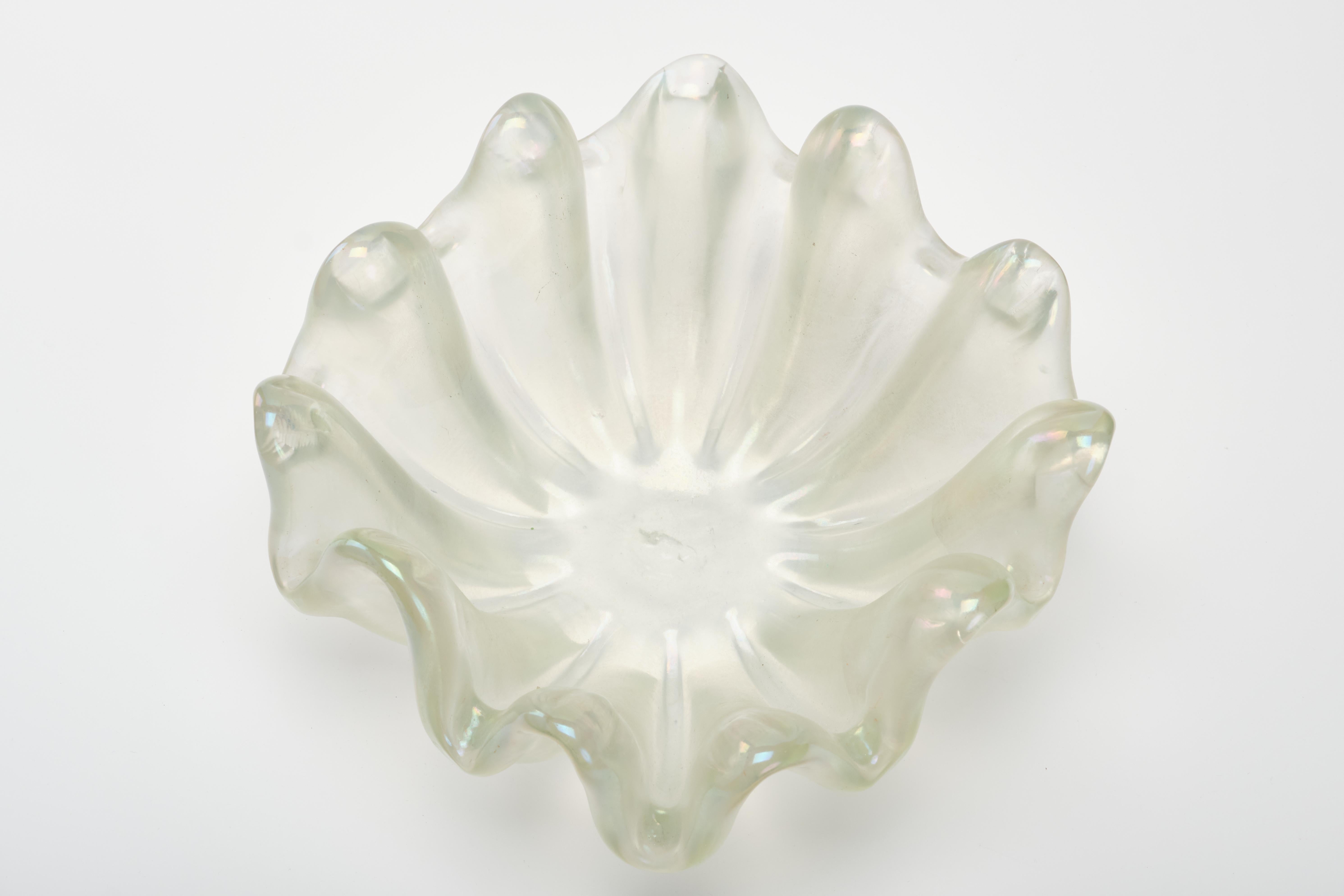Ercole Barovier shell shaped centerpiece of the series Grosse costolature. Barovier & Toso, Murano, 1940s.  
Since the 1920s he has participated in national and international events relating to glass and furnishings. Throughout his career he