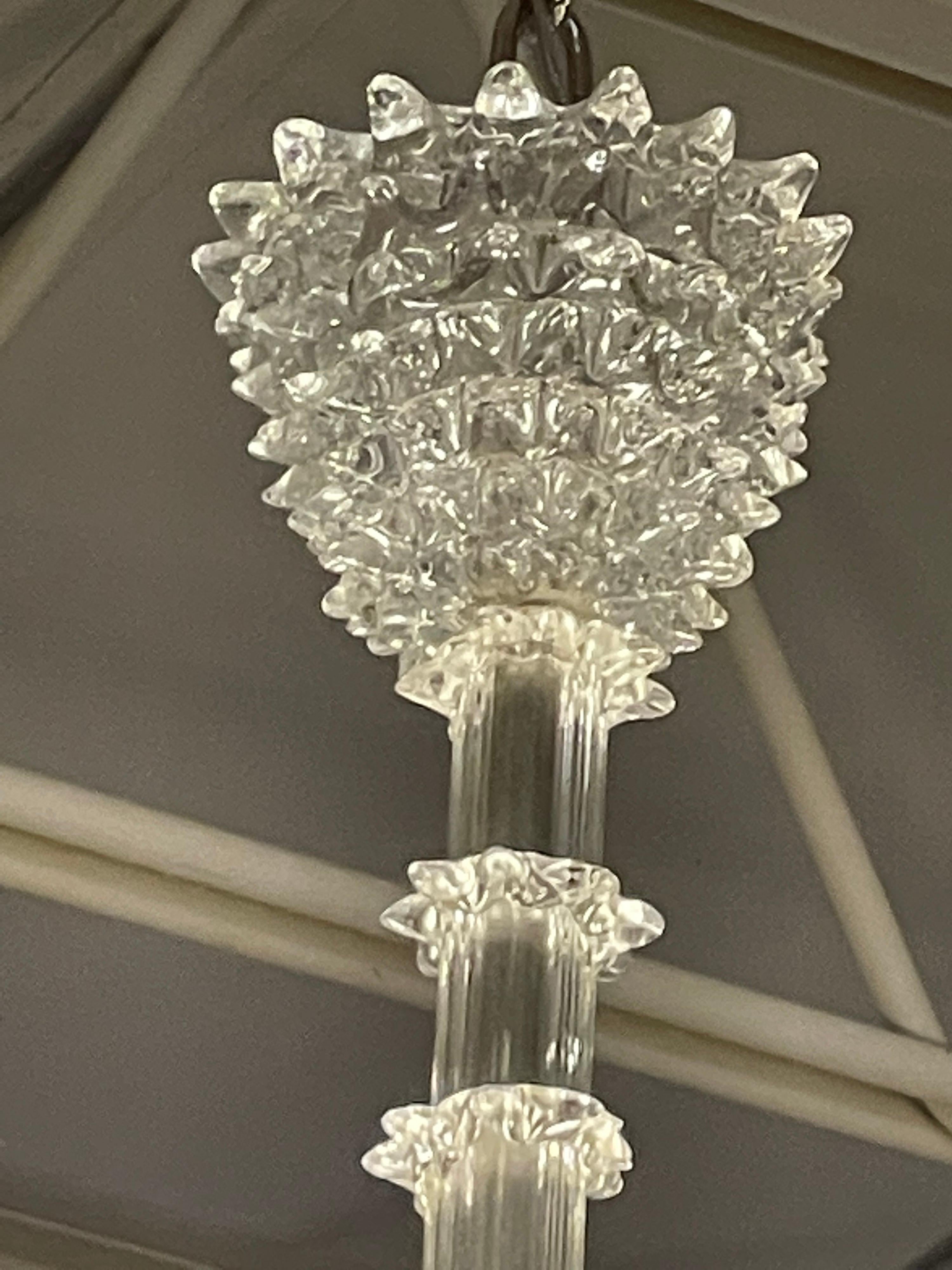 A very elegant Italian chandelier by Ercole Barovier hand blown Murano glass construction using the Rostrato technique. The details abound on this beauty. This design was first presented at The Biennale di Venezia in 1938.