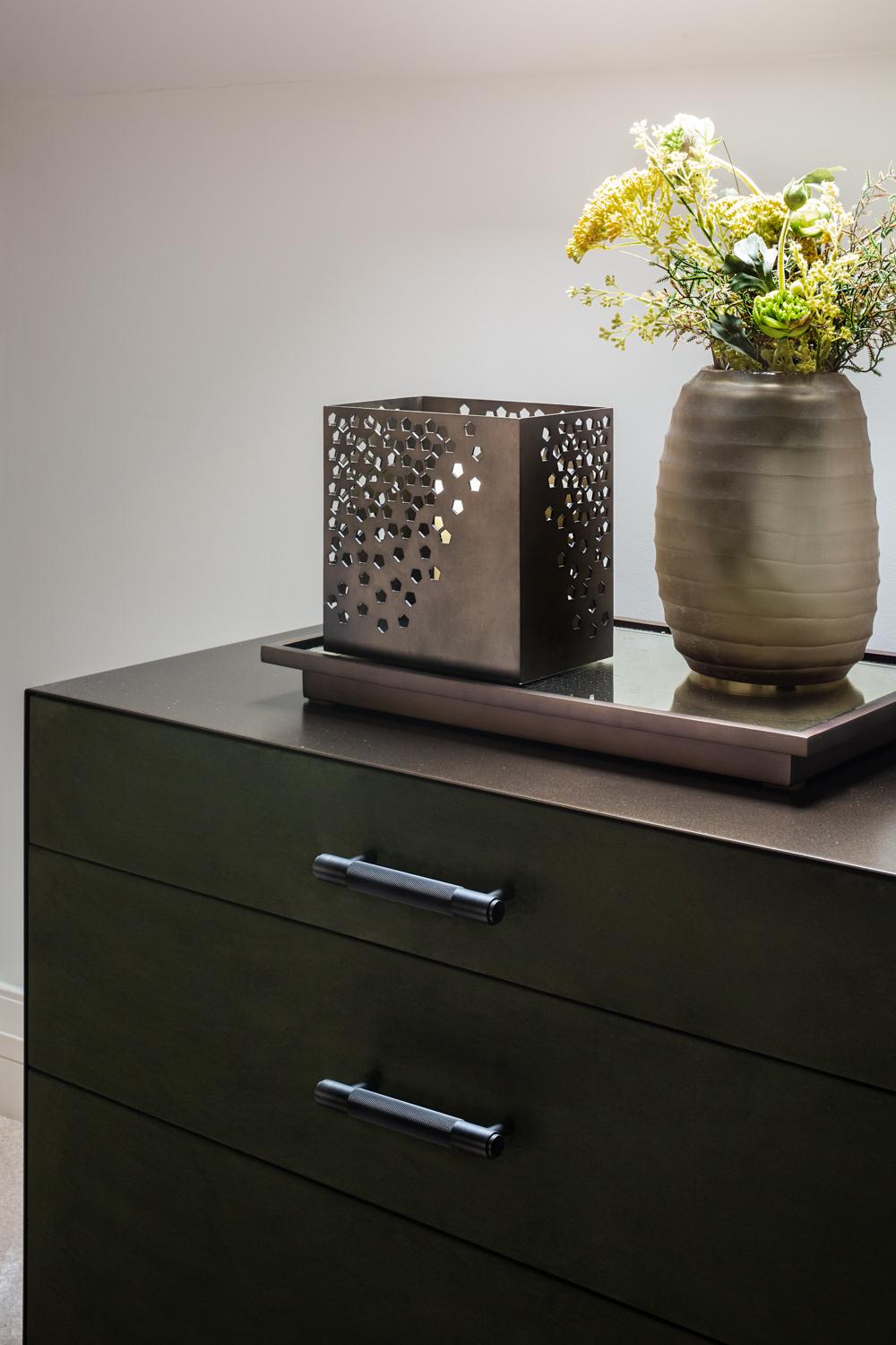 Behold! Feast your eyes upon the architectural wonder that exudes a daring interplay of materials, textures, and razor-sharp contours. This masterpiece demands attention while gracefully complementing its environs. The Ercole Chest of Drawers, a