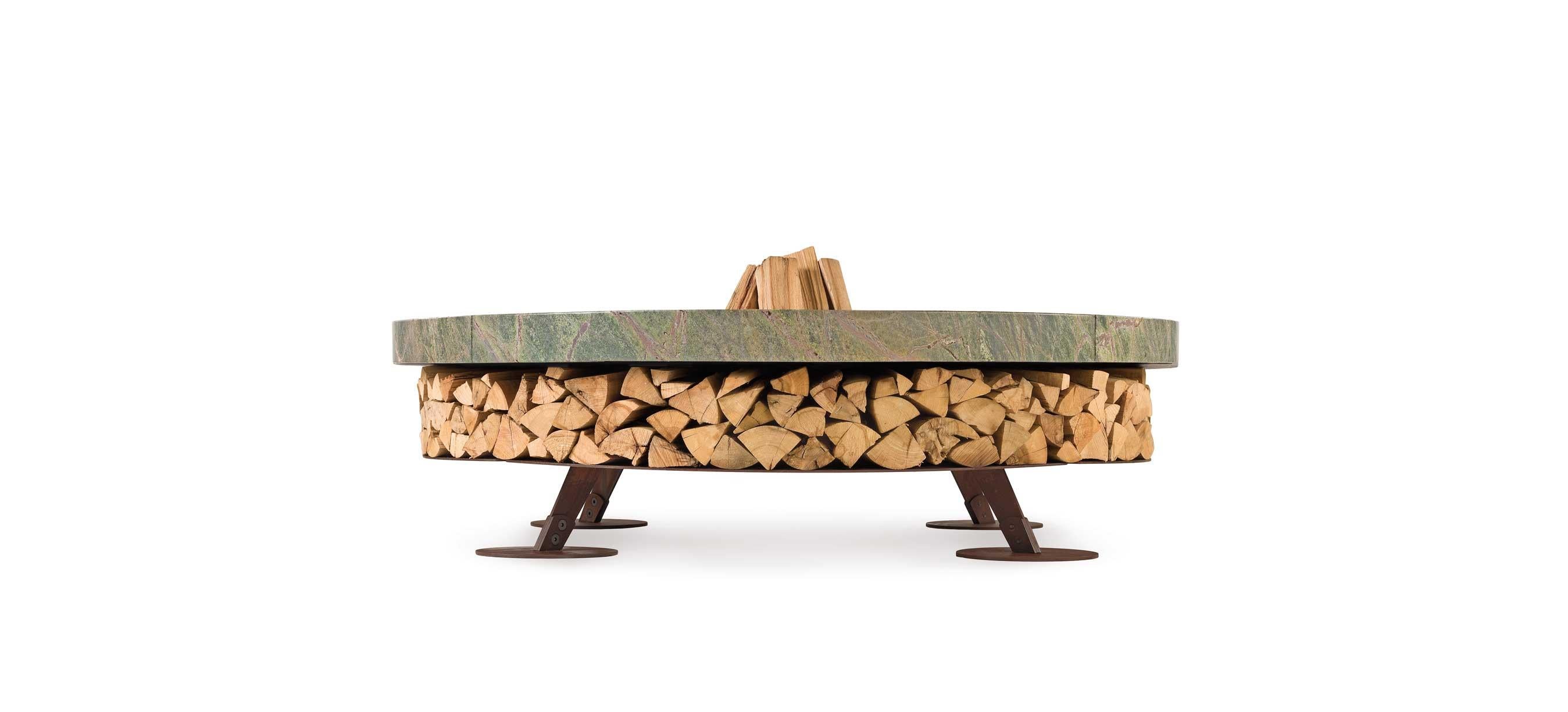 Ercole small rain forest green marble fire pit by AK47 Design.

Rain Forest Green marble fire pit Ø1500 mm.
Ercole is a outdoor wood-burning fire pit.
It is born by the union of two raw materials – the steel as a structural element and the
