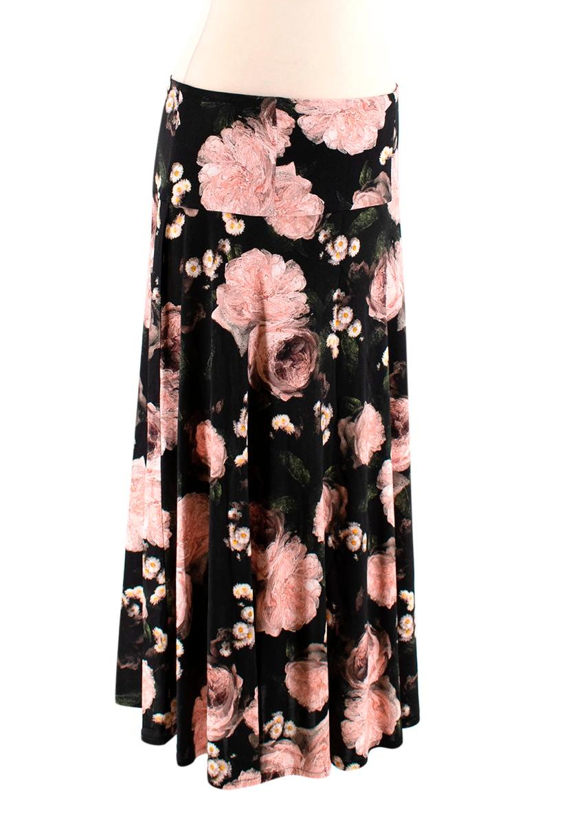 Erdem Pink & Black Roses & Daisies Print Jersey Skirt

-Soft comfortable jersey fabric 
-Gorgeous daisies and roses print 
-Midi length 
-Flowy flared cut 
-Fun yet neutral piece 

Materials:
100% viscose 

Hand wash 

Made in Portugal 

Waist- 38