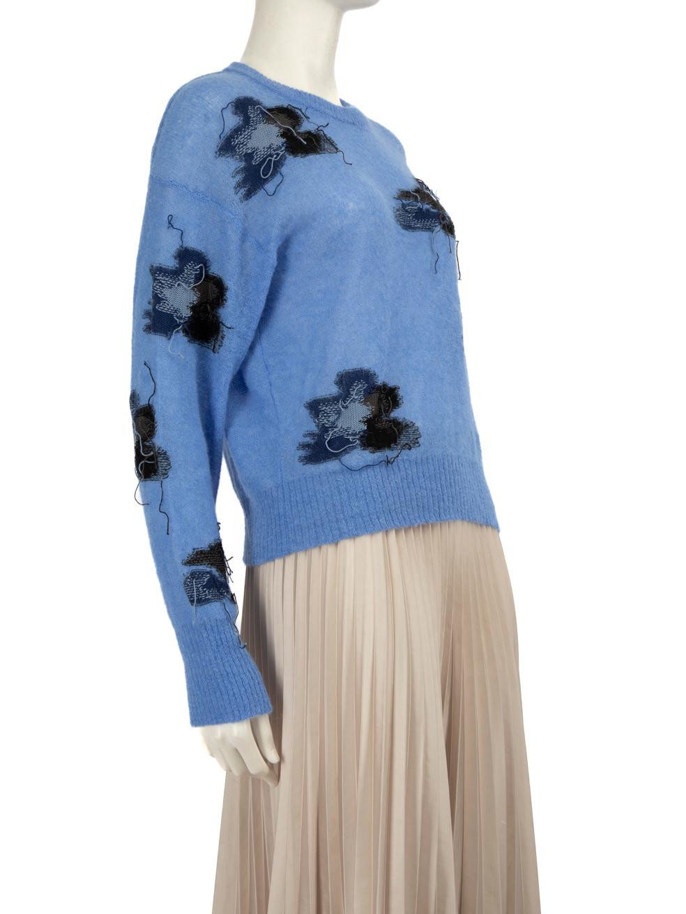 CONDITION is Very good. Hardly any visible wear to the sweater is evident on this used Erdem designer resale item. Please note that the item is purposely distressed.
 
 Details
 
 
 Blue
 
 Cotton
 
 Knitwear
 
 Long sleeves
 
 Stretchy
 
 Intarsia