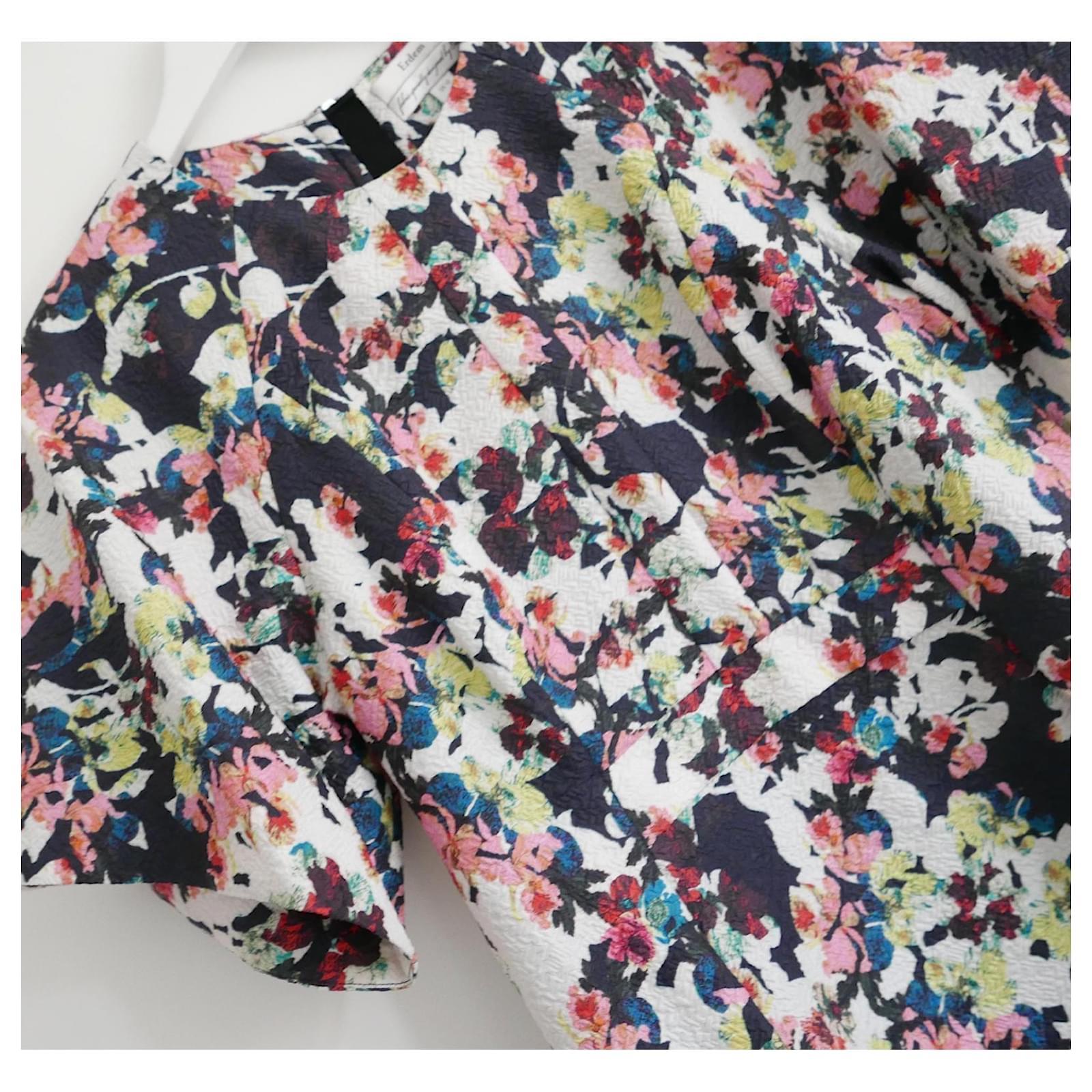Gorgeous Erdem Cliona dress - bought for £850 and unworn. Made from soft, vibrantly floral print, textured silk and nylon with silk lining. It has a flattering slim silhouette with tailored bodice and waist and side pockets. Zip to back. Size UK10.